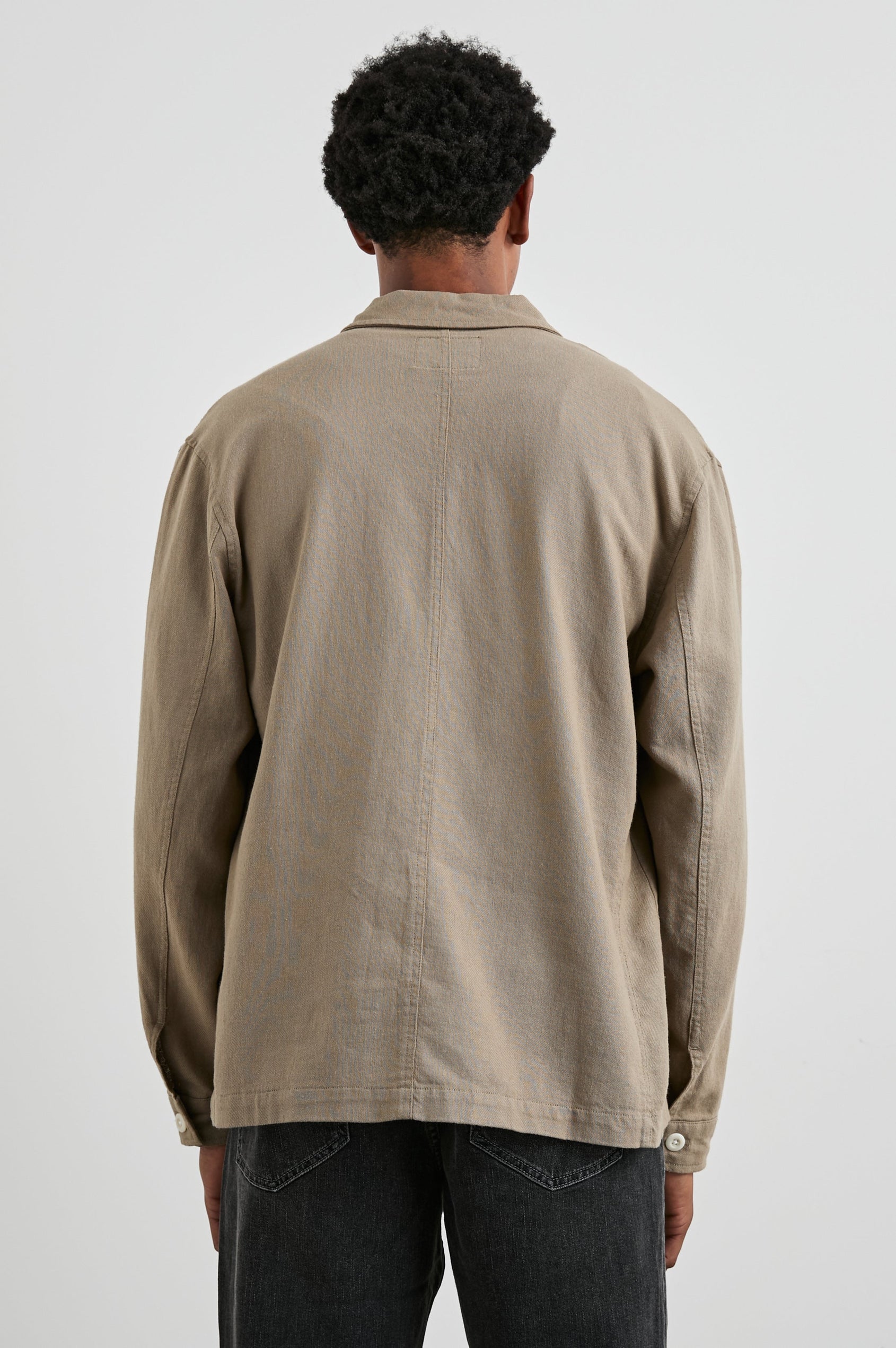 Ambrose Jacket with Button Closure, Two Front Patch Pockets and a Chest Patch Pocket in Barley Colorway - Back View Featured on Model