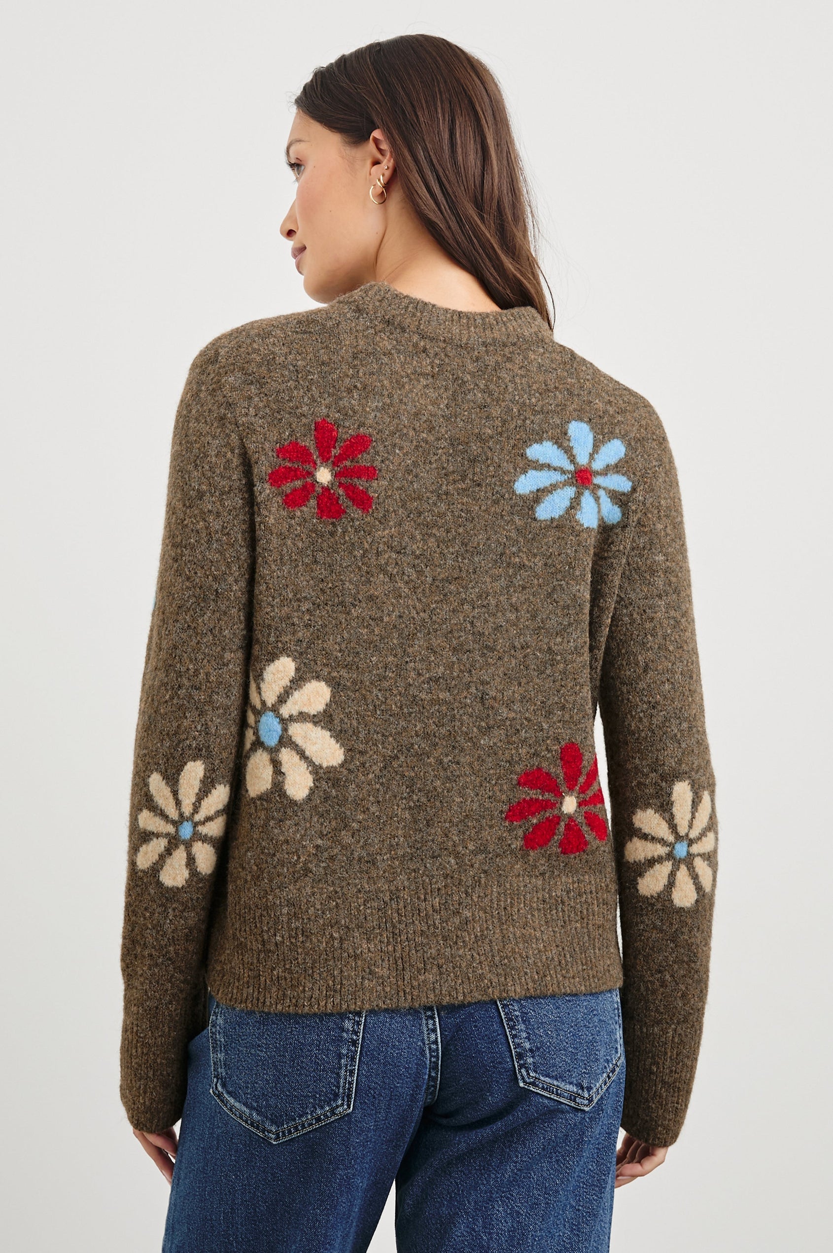 Anise Long-Sleeve Sweater with a Crew Neck and Ribbed Trim in Winter Floral Colorway, with Blue, Cream and Red Flowers on Brown - Back View Featured on Model