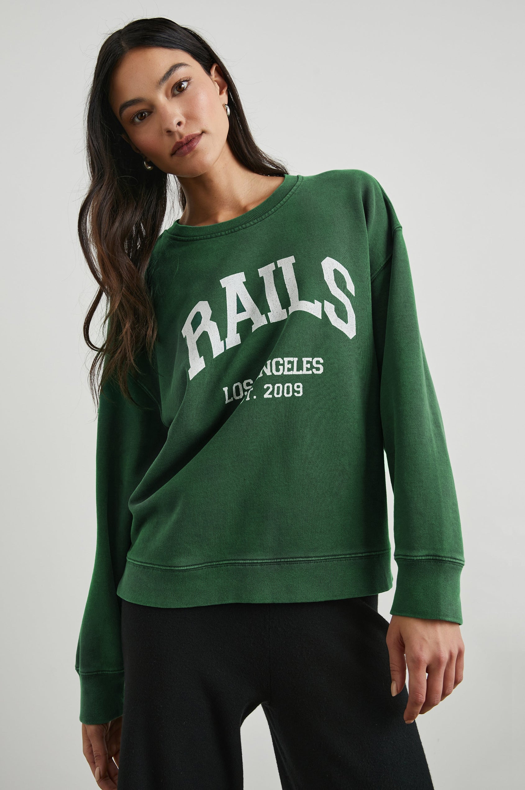 Anniversary Sweatshirt with Crewneck, Text States, Rails Los Angeles Est 2009, in Forest Colorway with White Letters - Front View Featured on Model