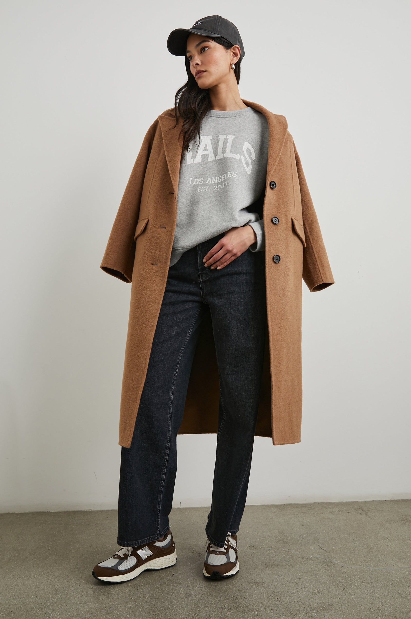 Anniversary Sweatshirt with Crewneck, Text States, Rails Los Angeles Est 2009, in Heather Grey Colorway with White Letters - Front Full Body View with jacket Featured on Model