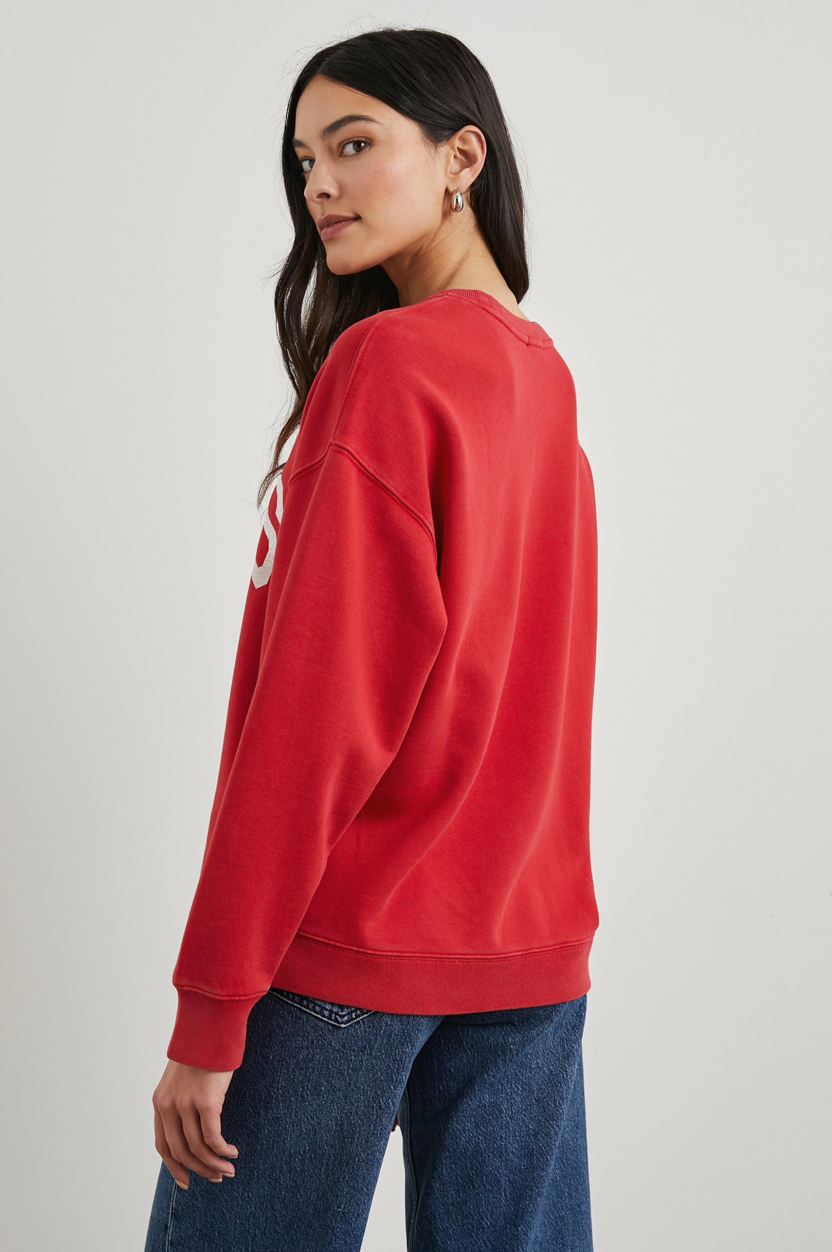 Anniversary Sweatshirt with Crewneck, Text States, Rails Los Angeles Est 2009, in Washed Red Colorway with White Letters - Side View Featured on Model