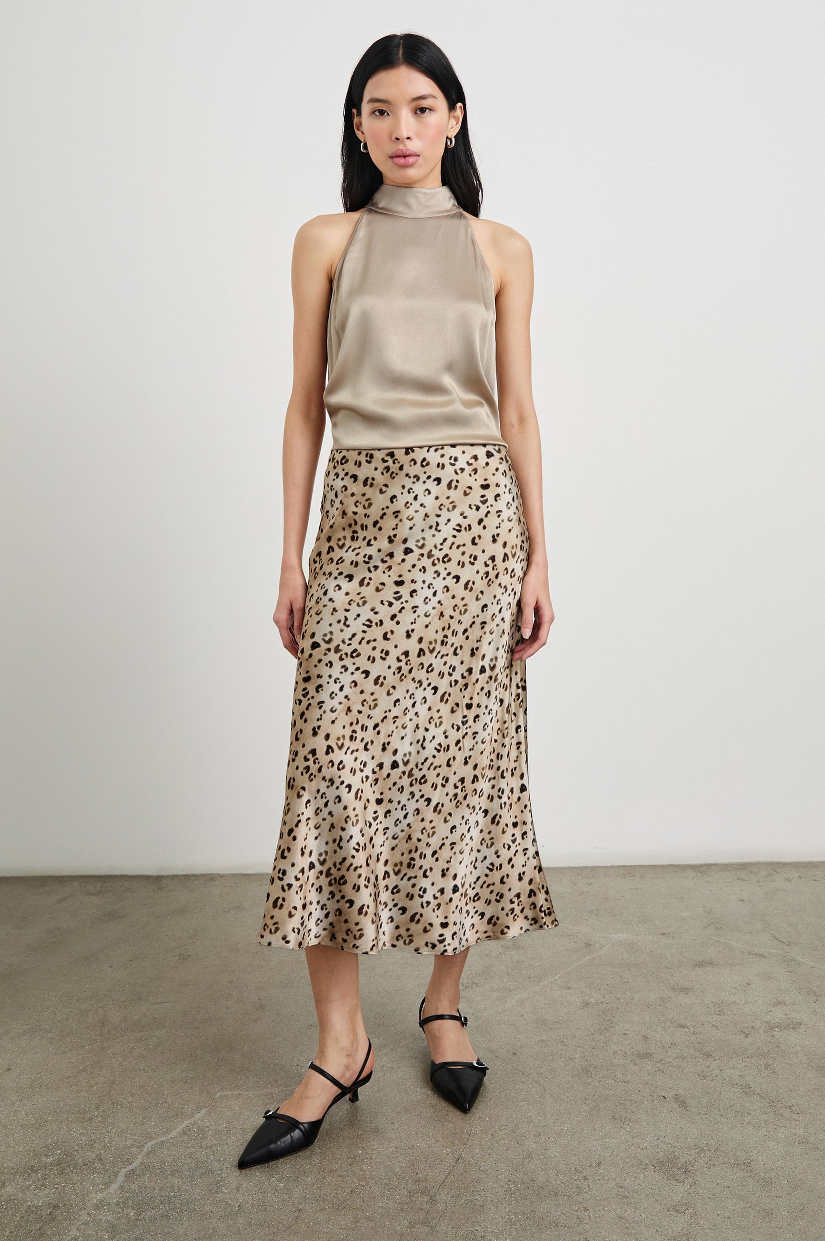 Anya High-waisted Midi Skirt in Champagne Leopard Colorway, Brown and Black spots on Champagne - Front Full Body View Featured on Model