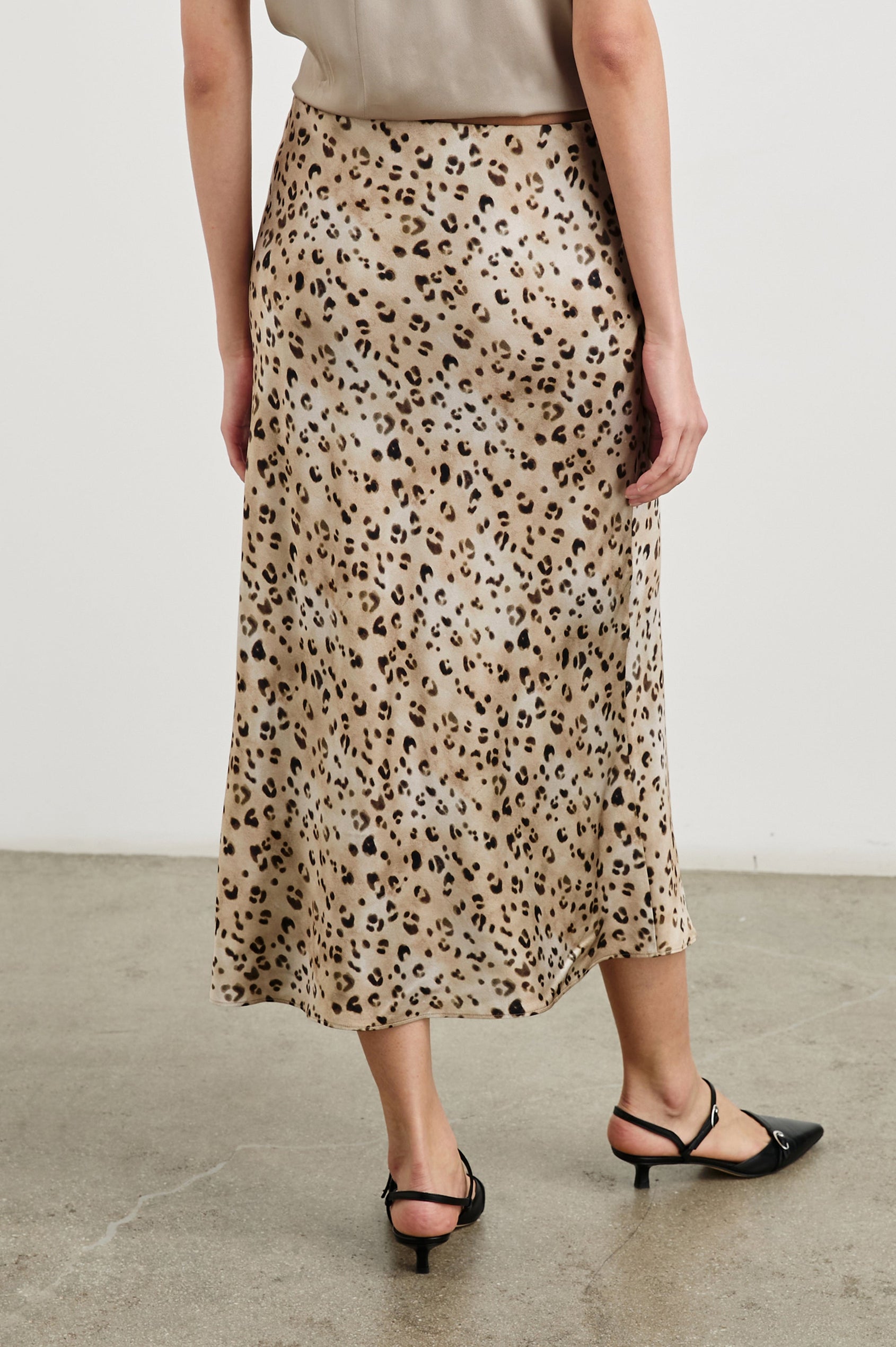 Anya High-waisted Midi Skirt in Champagne Leopard Colorway, Brown and Black spots on Champagne - Back View Featured on Model