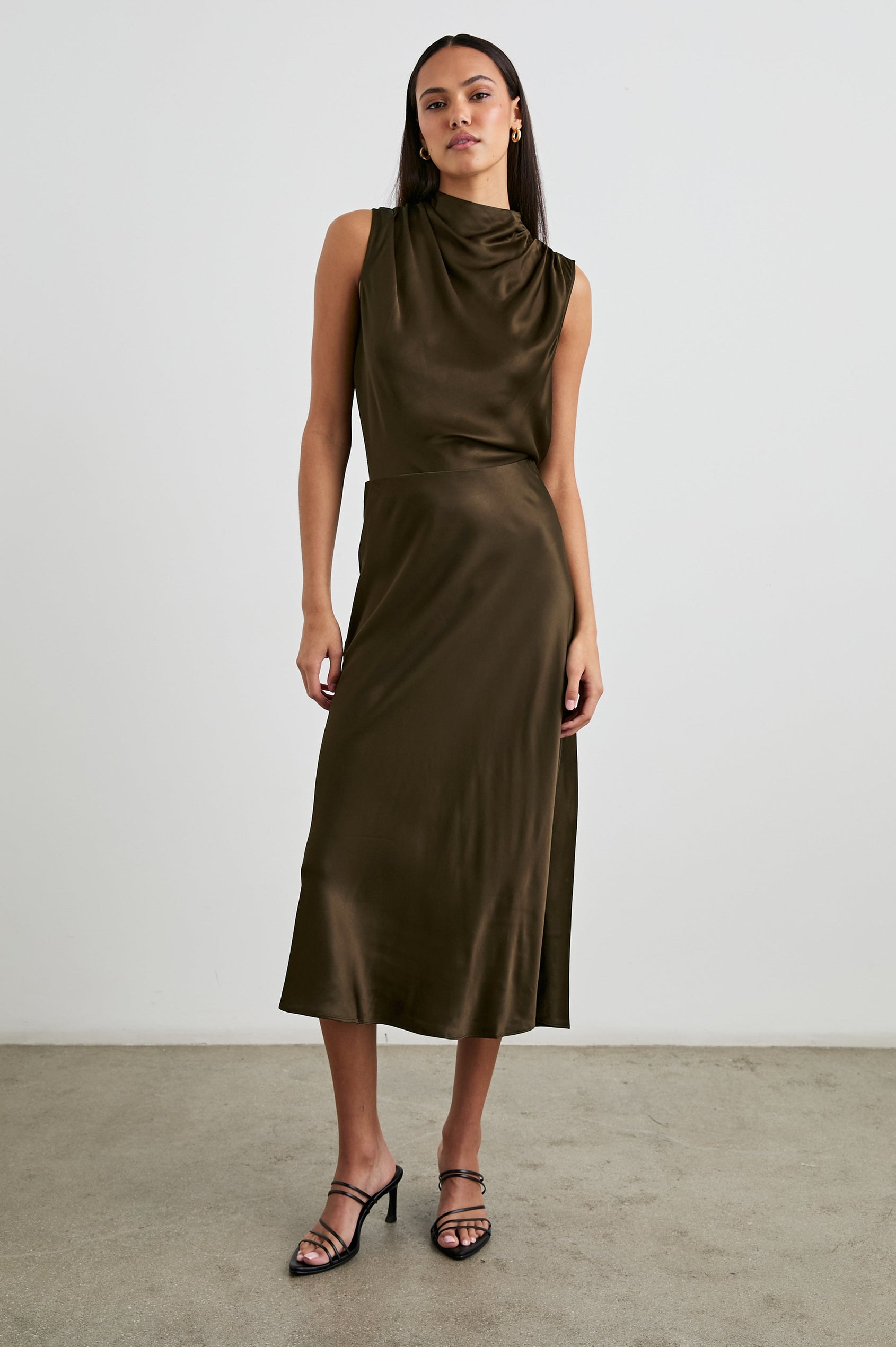 Anya High-waisted Midi Skirt in Dark Moss Colorway - Front Full Body View Featured on Model