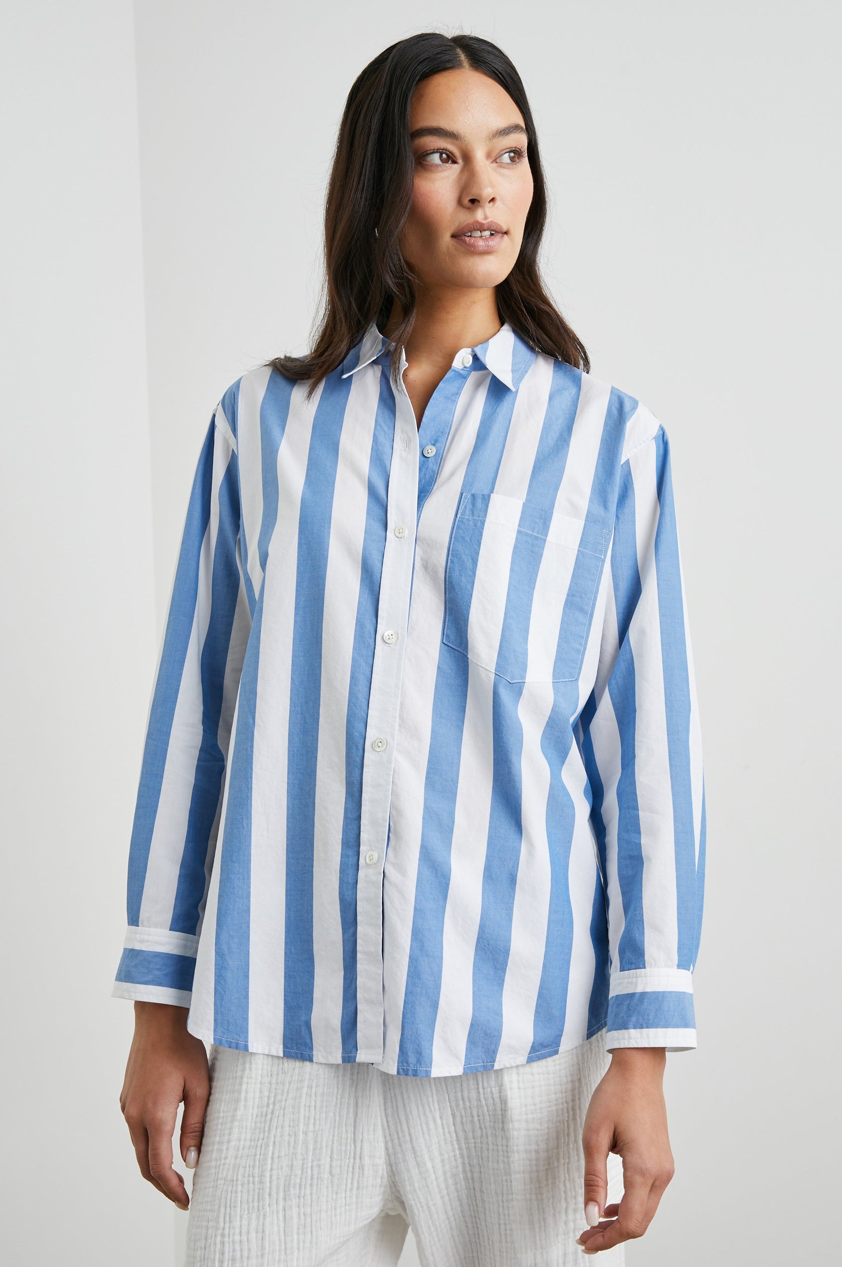Arlo Long Sleeve Button Up with Chest Patch Pocket in Rue Stripe Colorway, vertical blue and white stripes - Front View Featured on Model