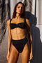 Bianca Underwire Top with Fixed Straps, 3-Point Adjustable Clip Back, U Front, Paneled Cup, Fossils Texture in Black Colorway. Front View Shown on Model.