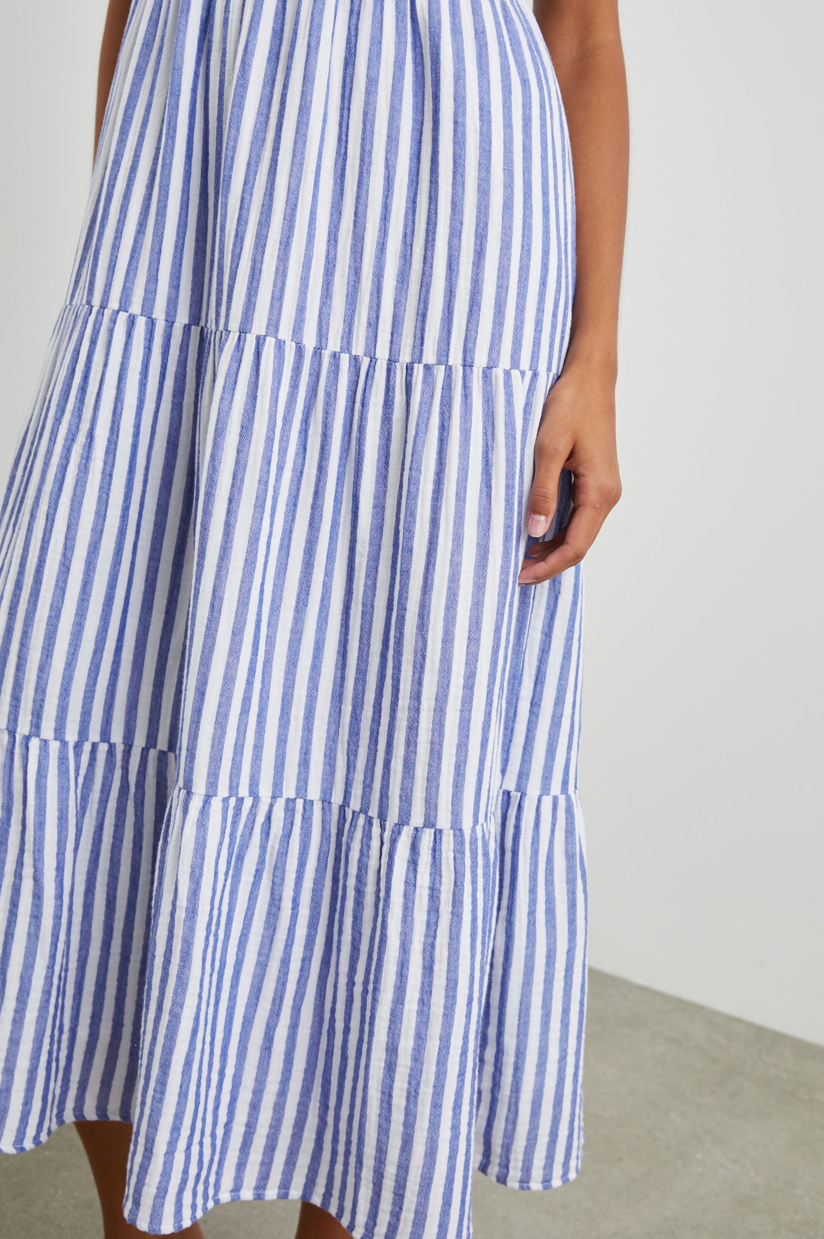 Blakely Sleeveless Tiered Midi Dress with Adjustable Spaghetti Straps and a Scoop Neck in Anacapa Stripe Colorway, Blue and White Vertical Stripes - Front View Featured on Model