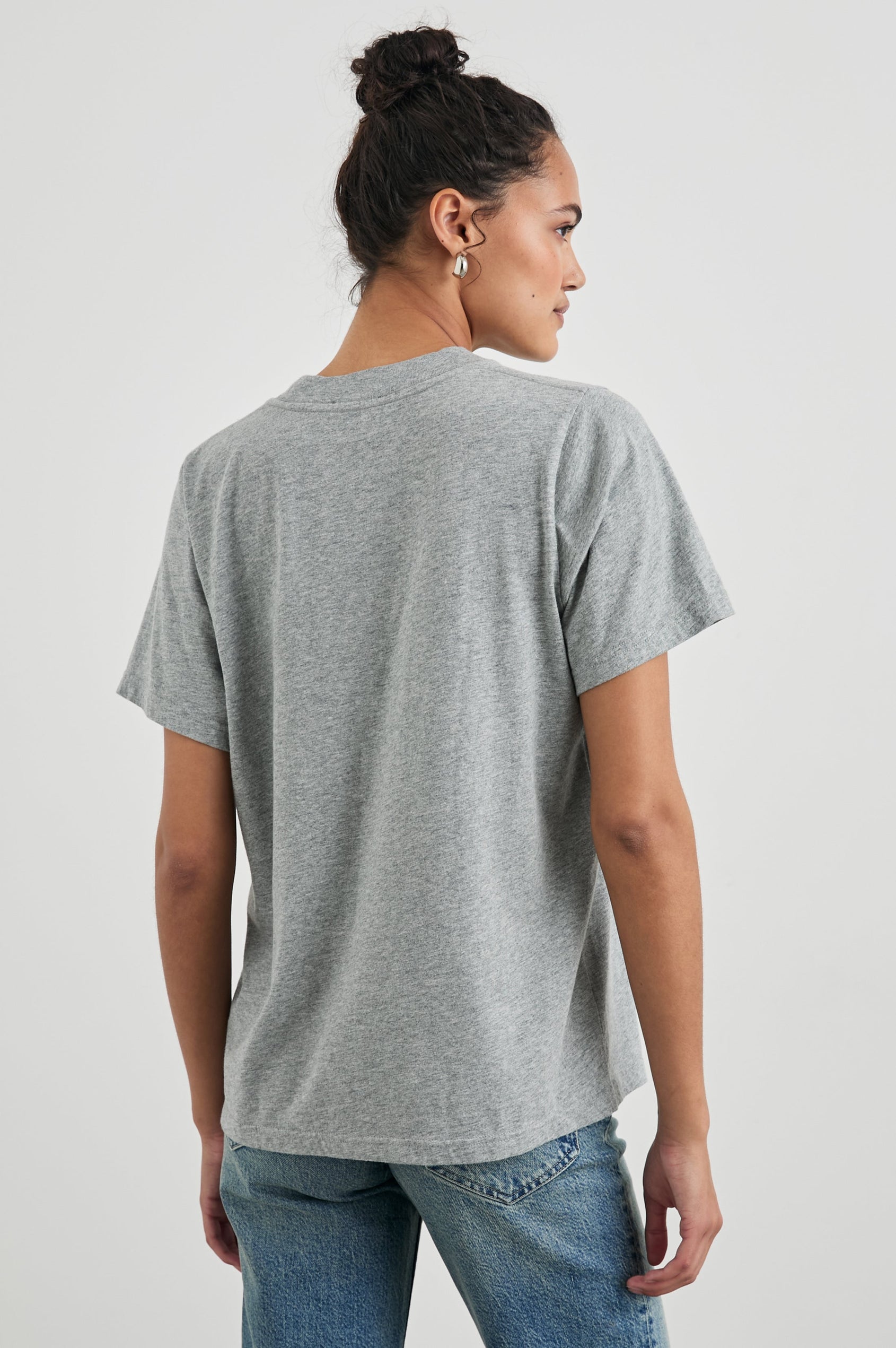 Boyfriend T-Shirt with a Crew Neck, images of London and the text, Rails London in Rails London Colorway, with text and image in pink, yellow and blue on a Grey shirt - Back View Featured on Model