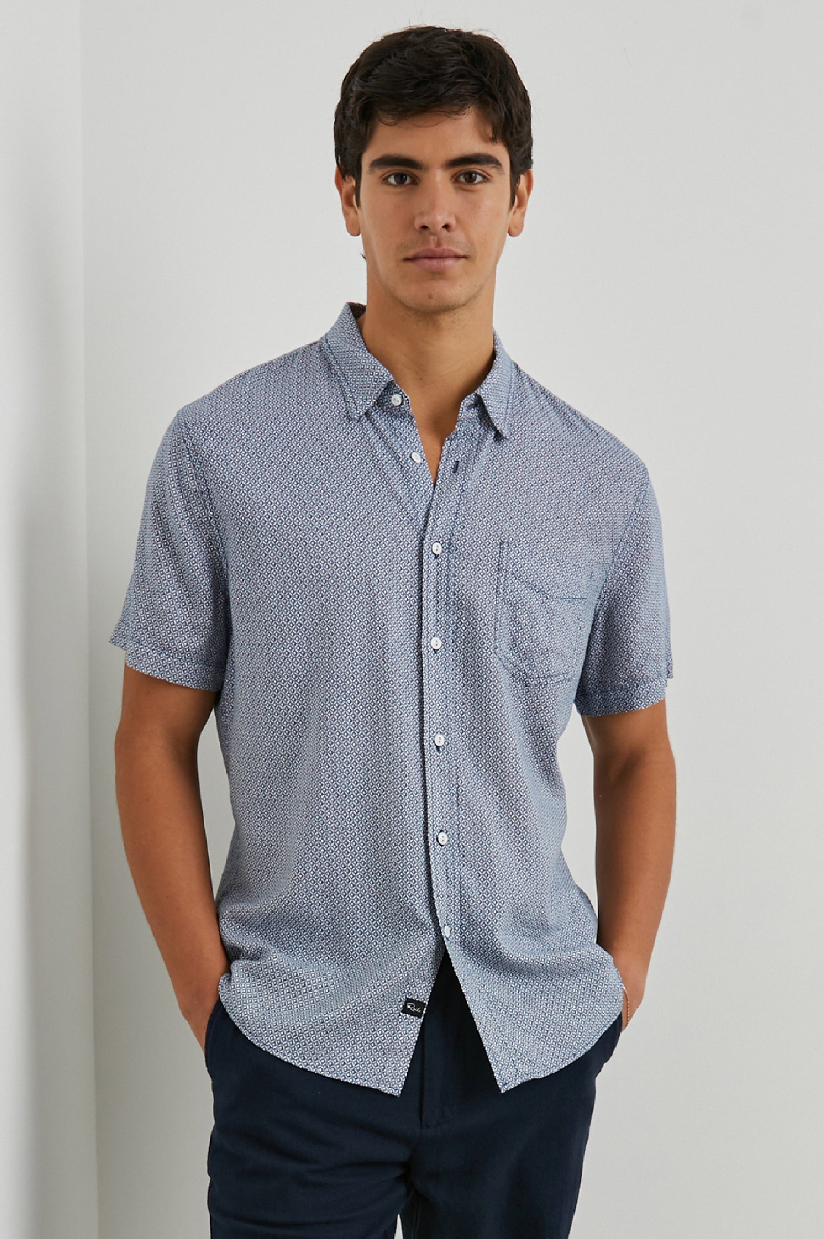 Carson Short Sleeve Button Up with a Chest Patch Pocket in Crown Jewel Sapphire Colorway, with a Small Diamond Pattern - Front View Featured on Model