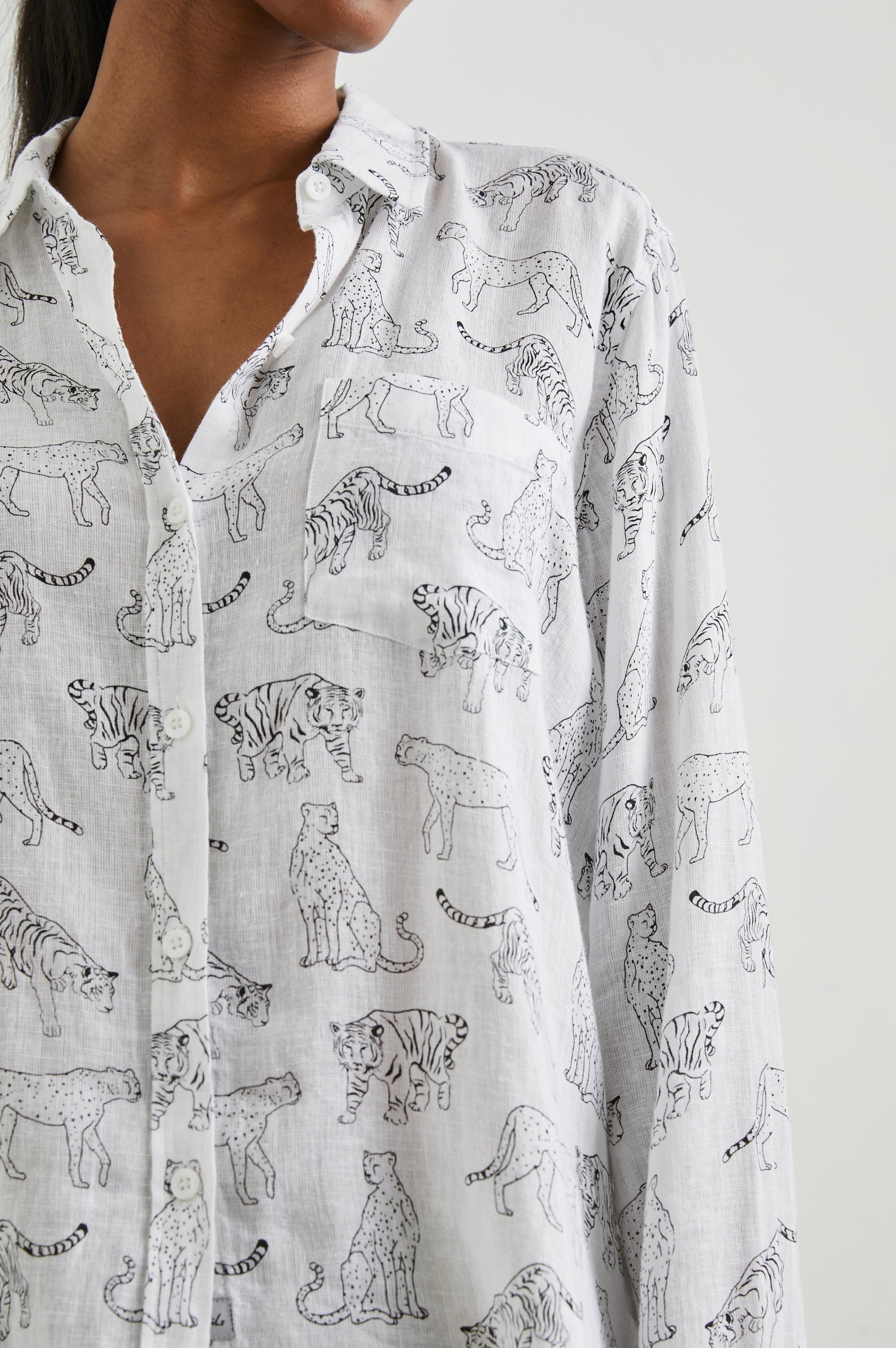Charli Long-Sleeve Button up with a Chest Patch Pocket in Ivory Jungle Cats Colorway, with black jungle cats on ivory - Front View Featured on Model