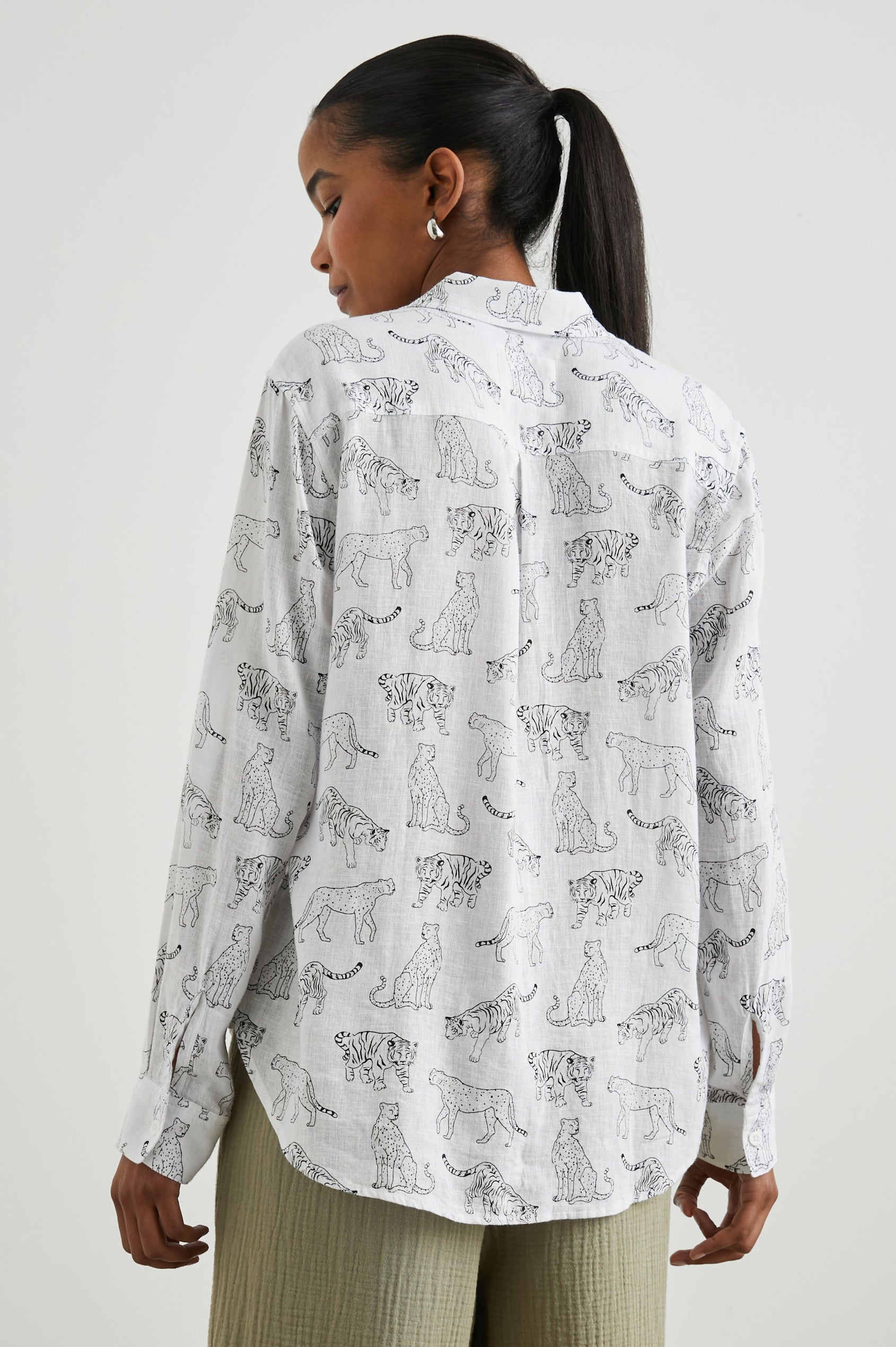 Charli Long-Sleeve Button up with a Chest Patch Pocket in Ivory Jungle Cats Colorway, with black jungle cats on ivory - Front View Featured on Model