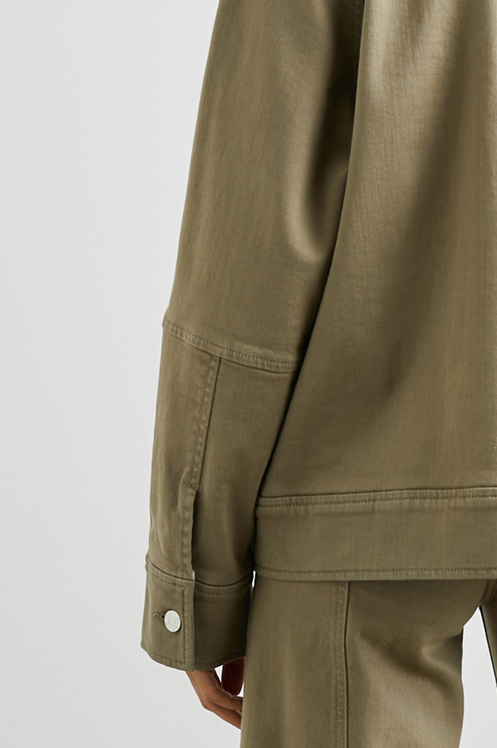 Cheyenne Denim Zip-Up Jacket with Two Chest Buttoned Flap Pockets in Washed Olive Colorway - Back View Featured on Model