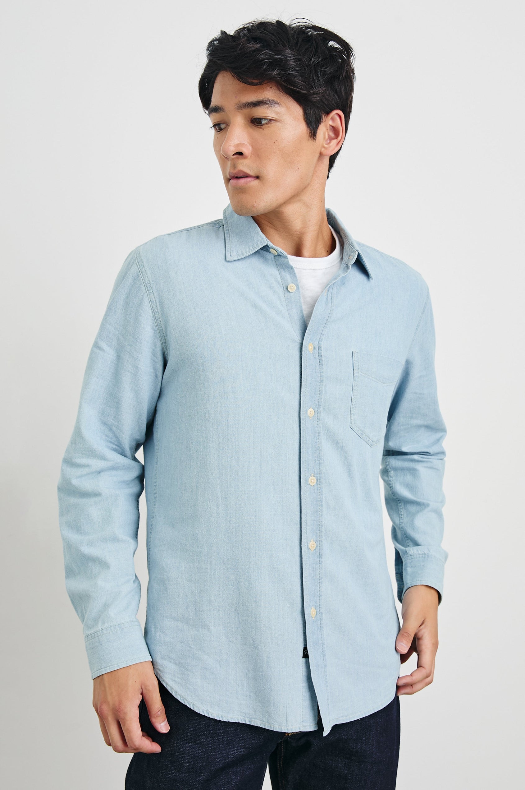 Colton Long-Sleeve Denim Button Up with a Chest Patch Pocket in Medium Vintage Wash Colorway - Front View Featured on Model