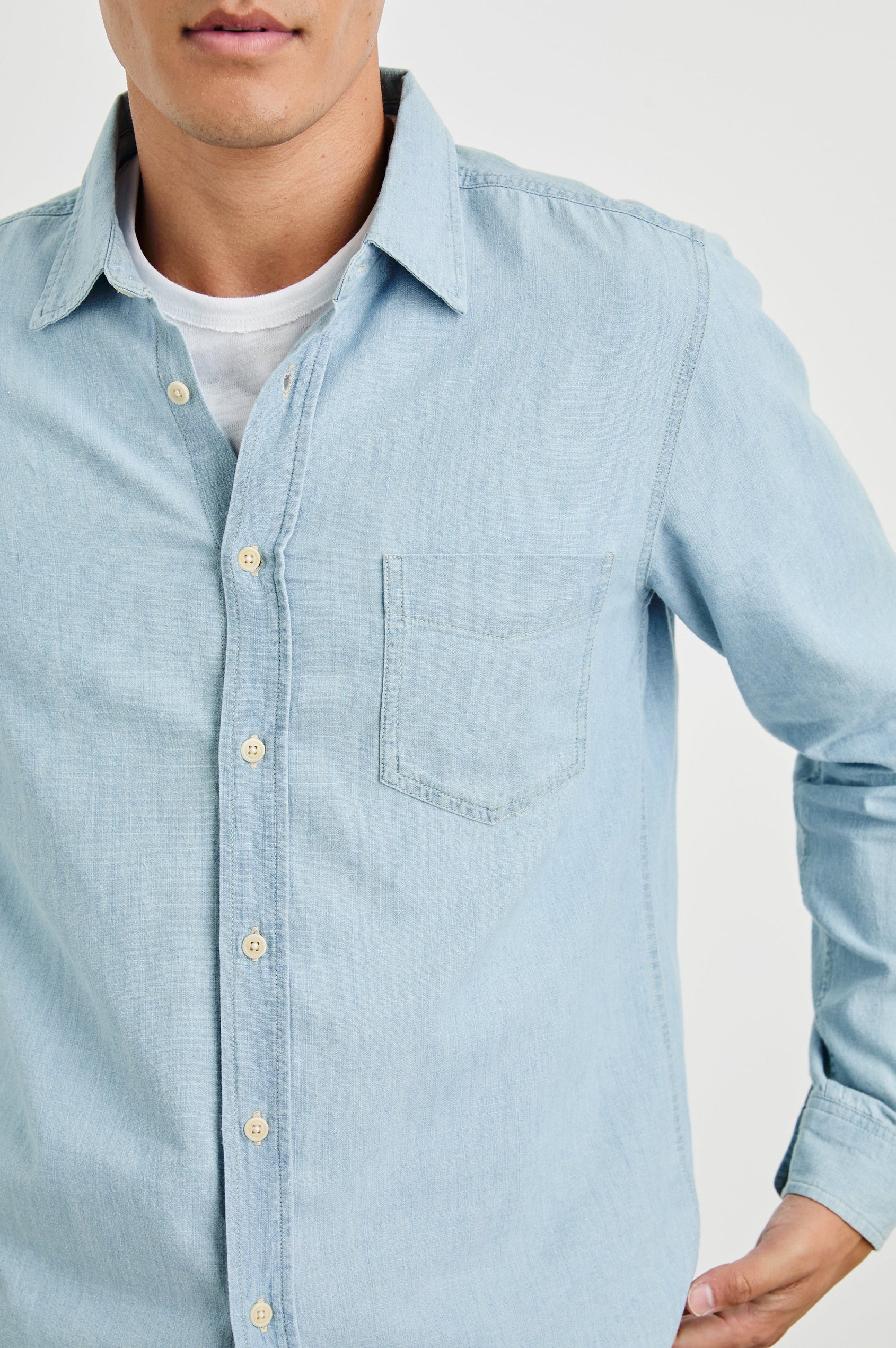 Colton Long-Sleeve Denim Button Up with a Chest Patch Pocket in Medium Vintage Wash Colorway - Front View Featured on Model