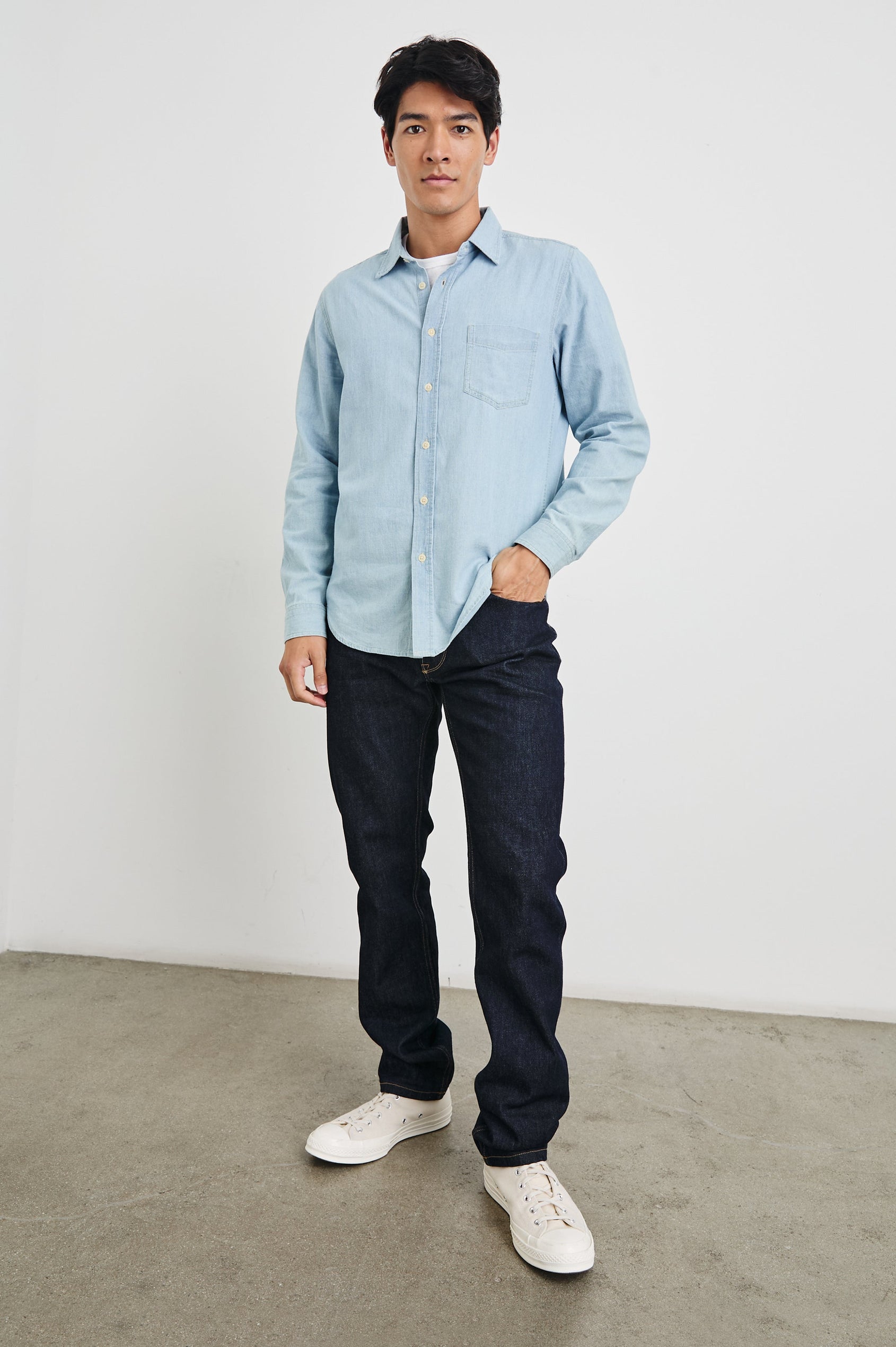 Colton Long-Sleeve Denim Button Up with a Chest Patch Pocket in Medium Vintage Wash Colorway - Front Full Body View Featured on Model