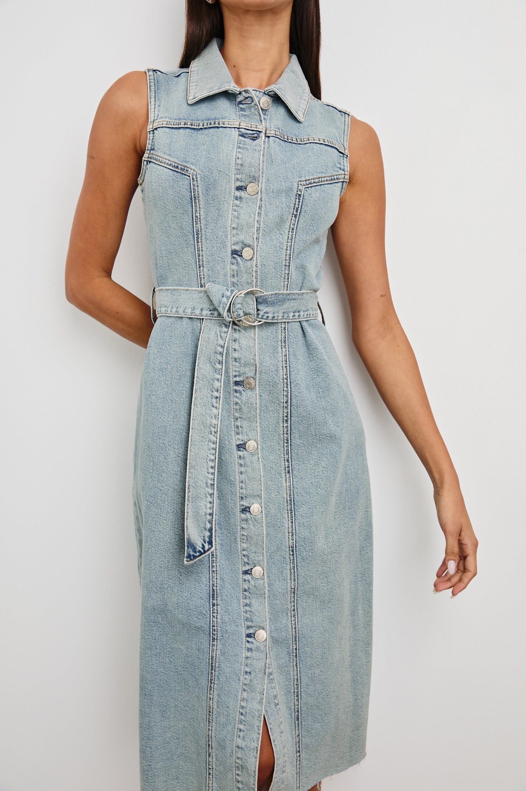 Costa form fitting, short sleeve denim midi dress with adjustable O-ring belt and front buttons in Low Tide - close up of details on model