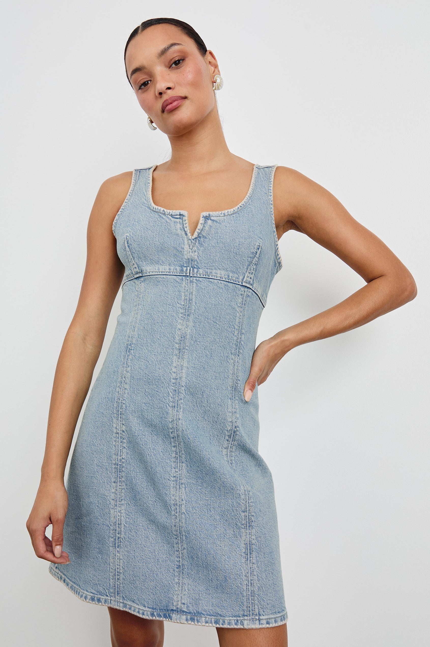 Cove Denim Tank Dress with a Scoop Split neck, Empire Bust, A-line and Above-Knee Length in Capri Colorway. Front View Shown on Model.