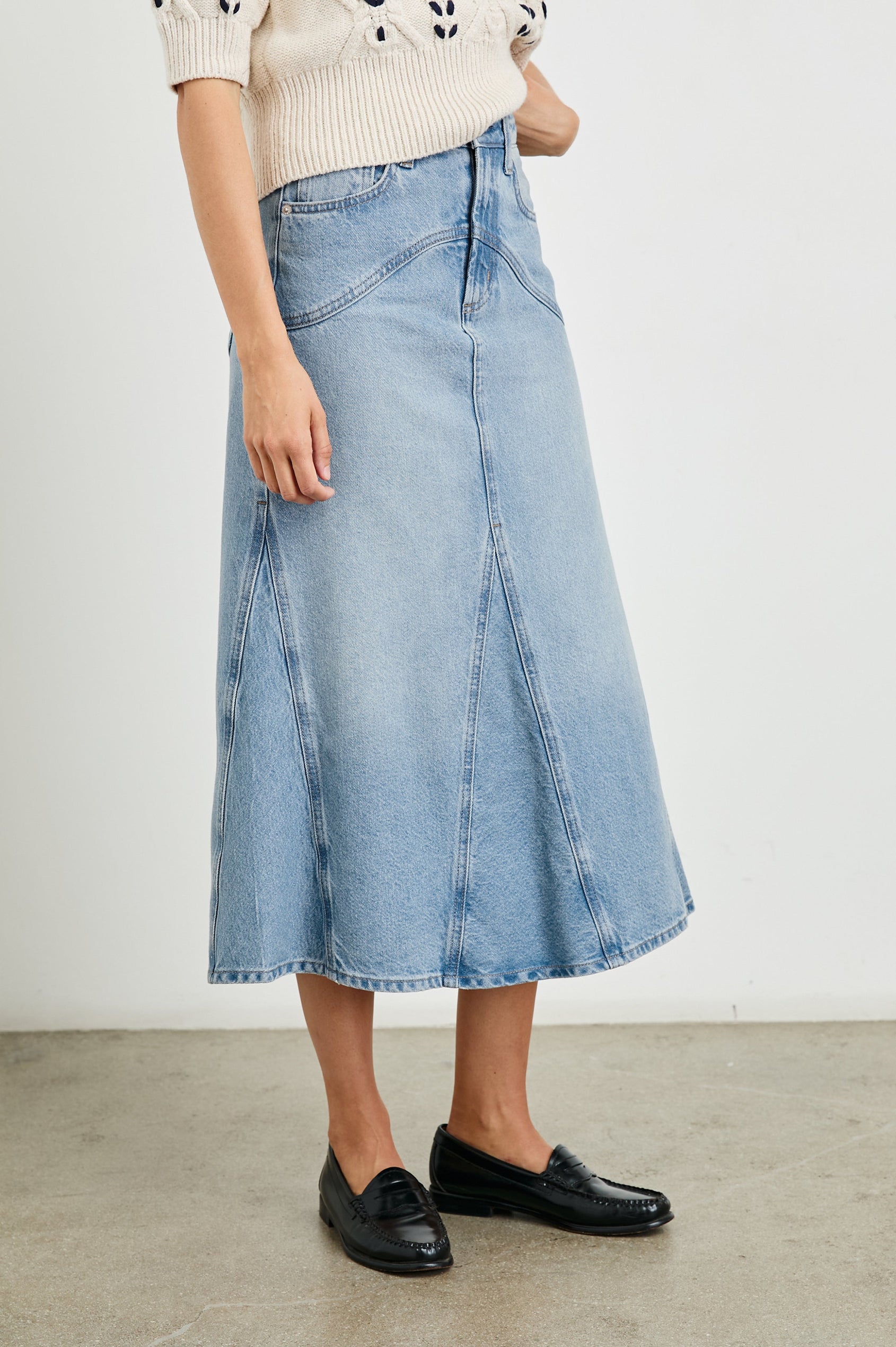 Del Rey Denim Midi Skirt with Western-Style Seams, Belt Loops, Two Front Pockets and Two Back Patch Pockets in Original Blue Colorway - Front View Featured on Model