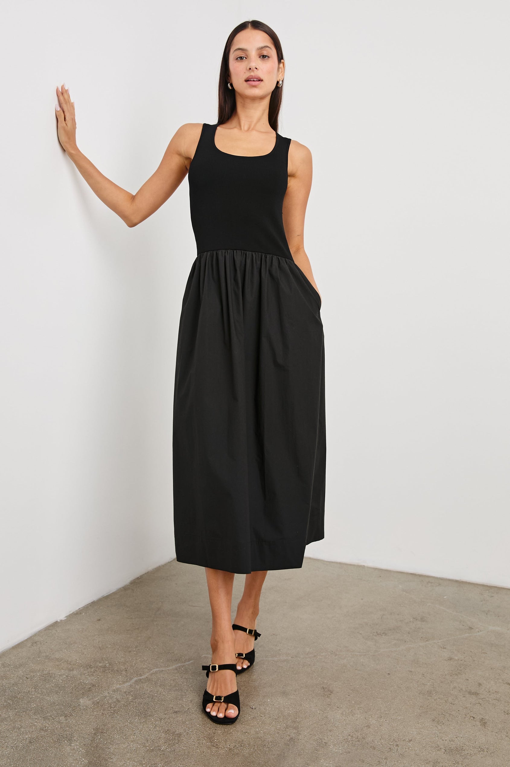 Dia tank midi dress with scoop neck and fitted bodice in Black - full body front view on model