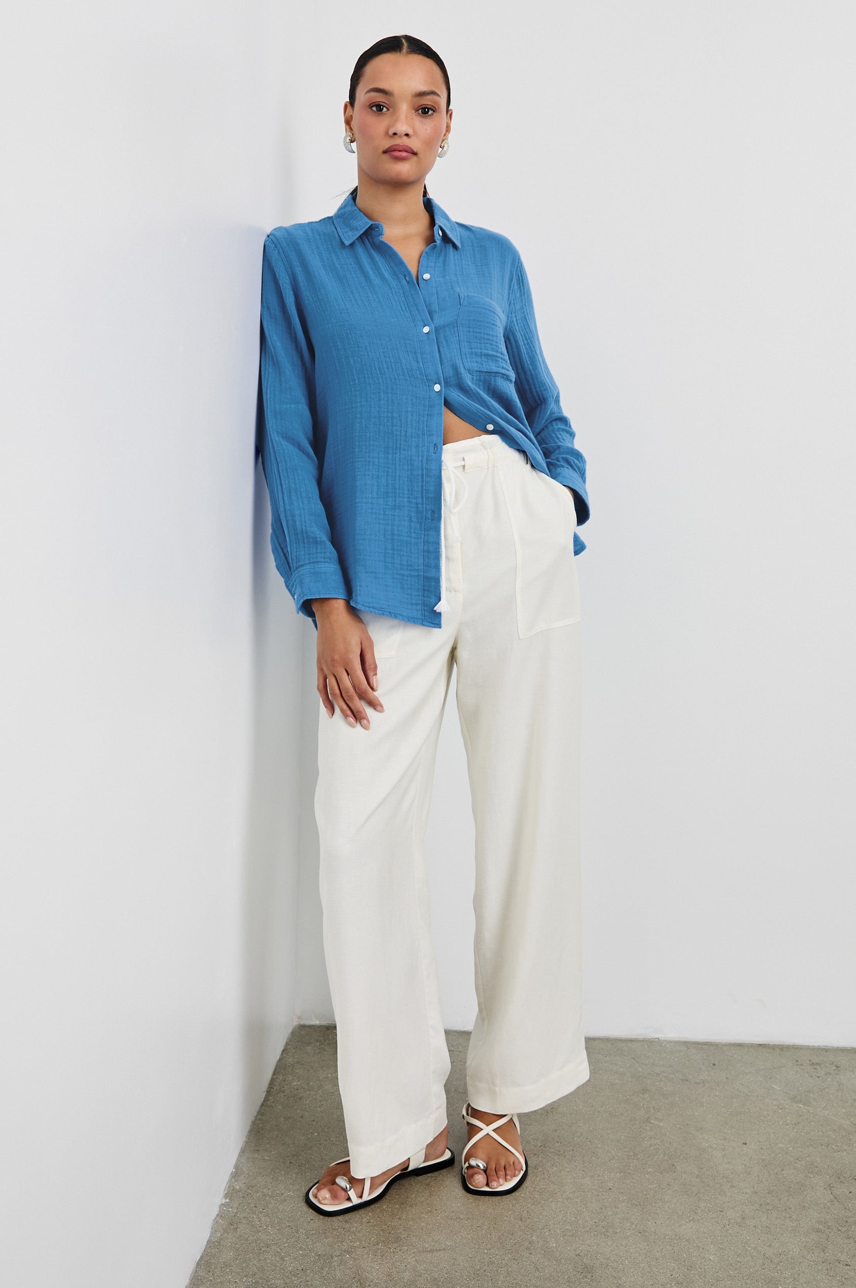 Ellis Relaxed Collared Button Front Shirt with Long Sleeves and a Chest Pocket in French Blue Colorway. Full Body Front View Shown on Model.