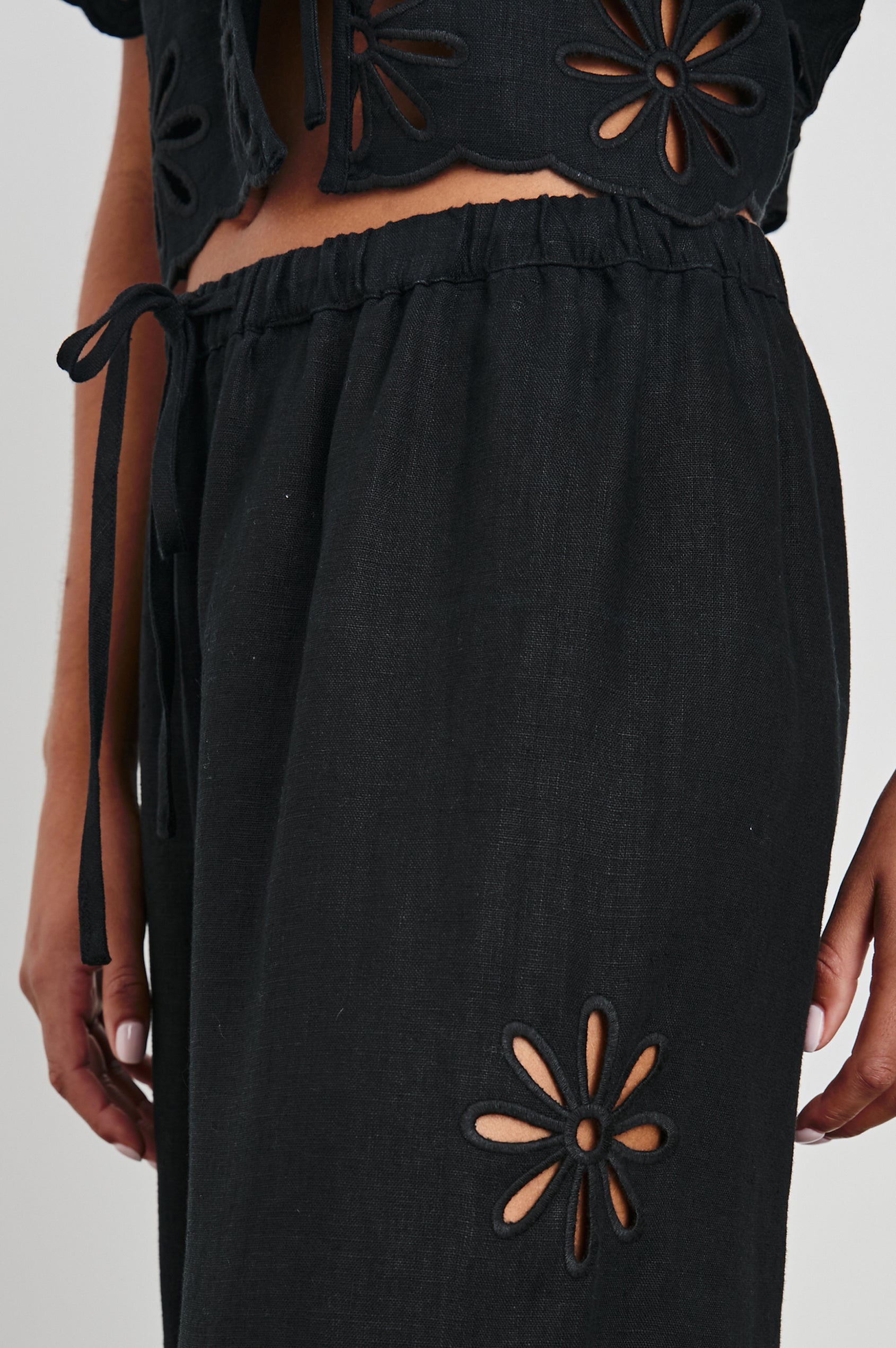 EMMIE-BLACK-EYELET-DETAIL