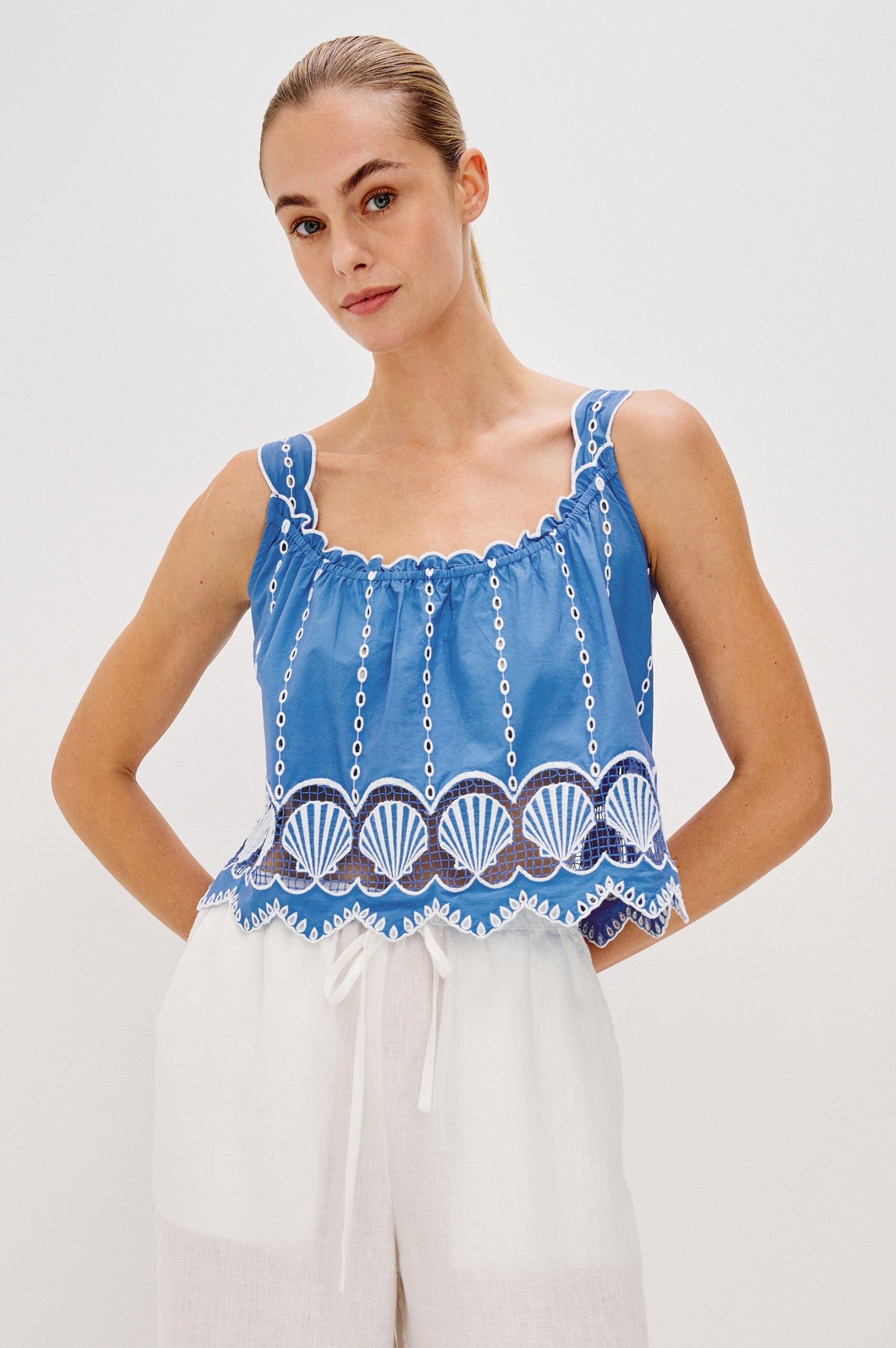 Esperanza Scoop Neck Tank Top with Sea Shell Embroidery and Scalloped Hems in French Blue Colorway. Front View Shown on Model.