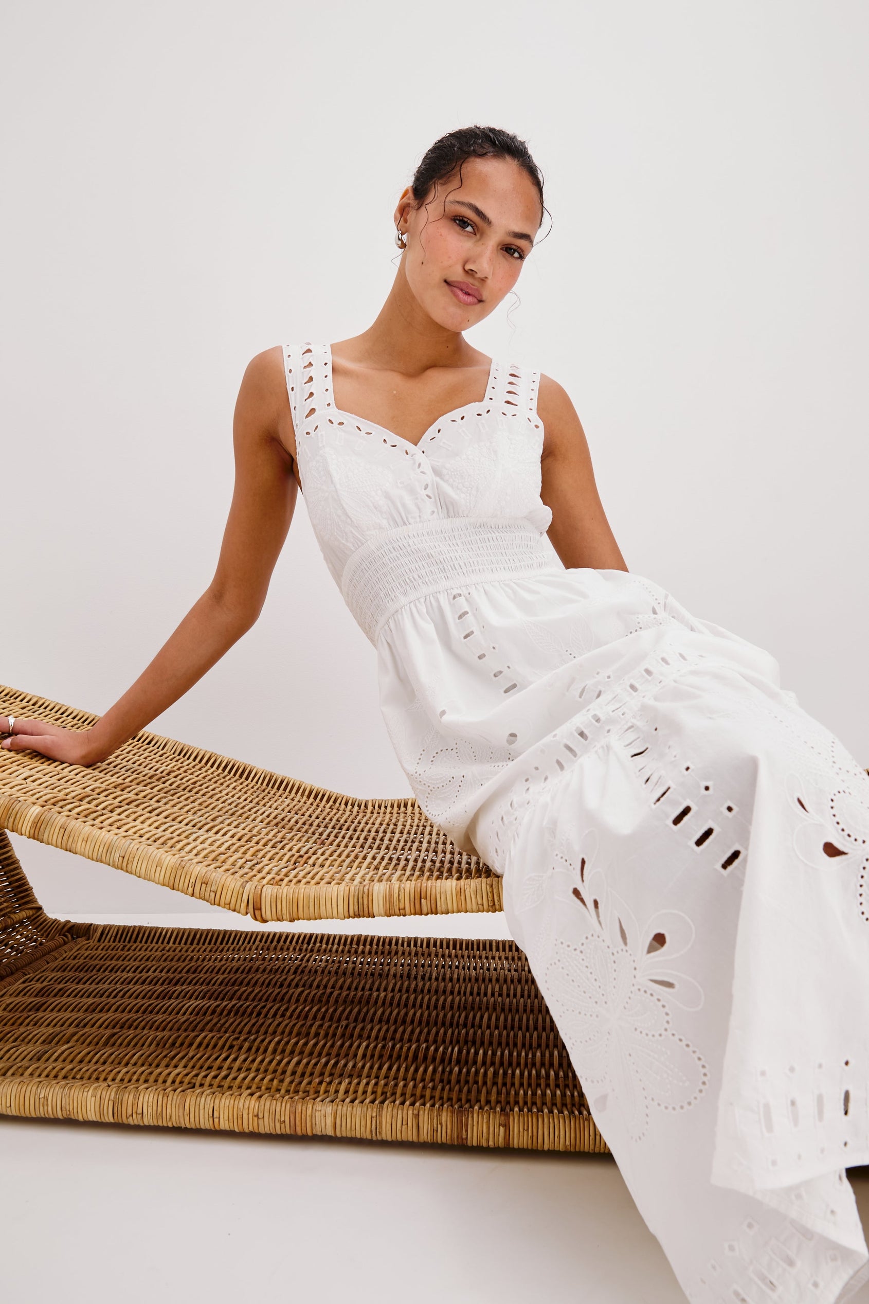 Fawn Midi Tank Dress with Wide Straps, Sweetheart Neck Line, Elastic Gathered Waist and Tiered Skirt in White Colorway. Front View Shown on Model.