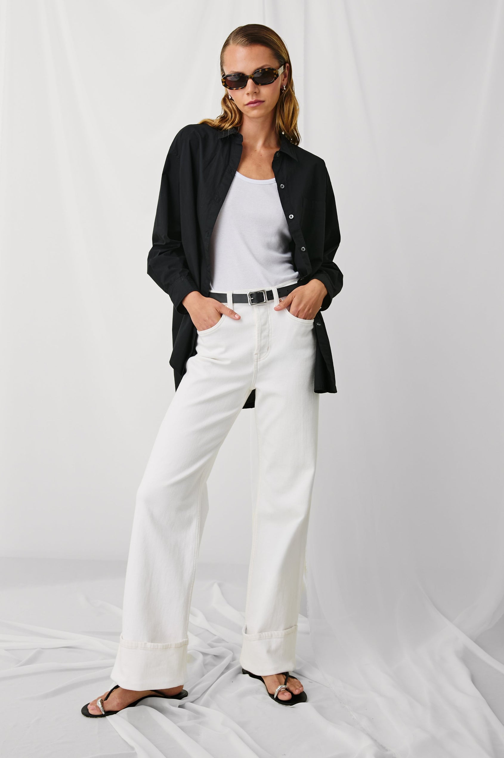 Getty high rise flared jean with long inseam and cuffed bottom details in Ecru Cuffed - stylized full body front view on model
