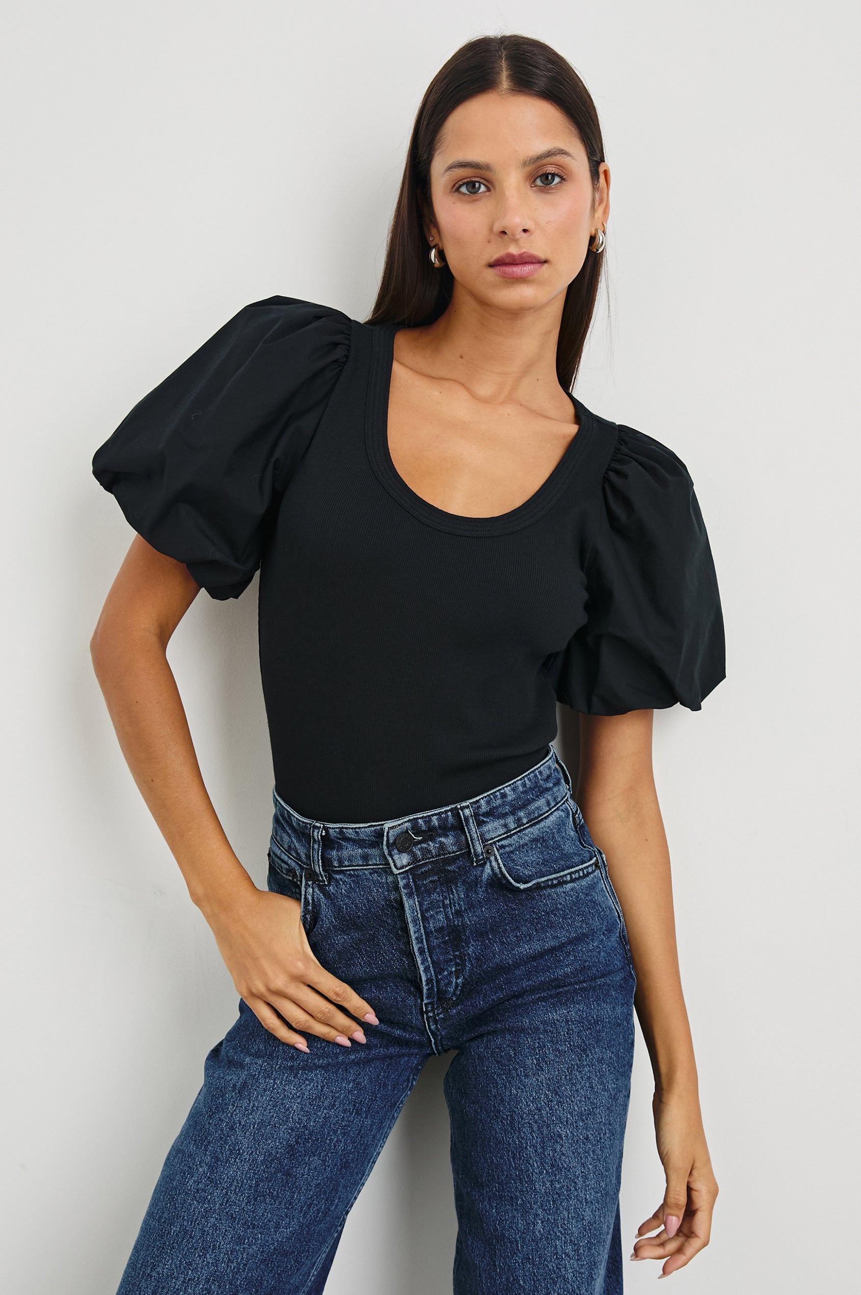 Hallie Short Sleeve Top with a Scoop Neck and Puff Sleeves in Black Colorway - Front View Featured on Model