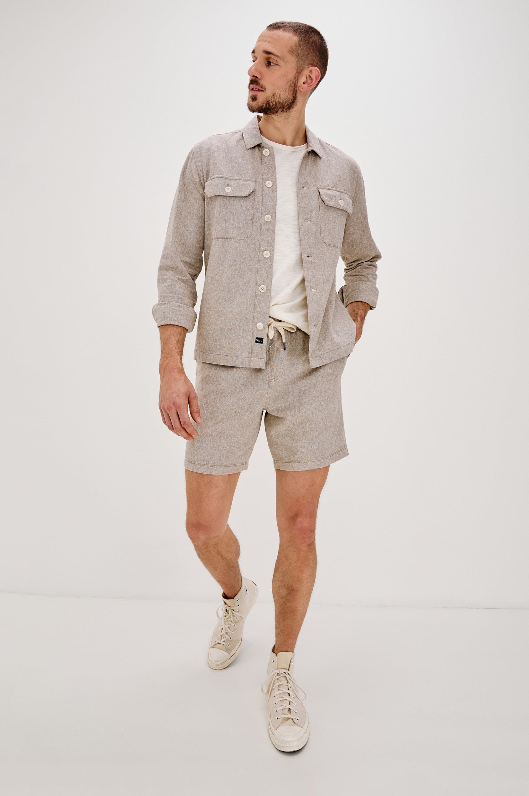 Hayes Shirt Jacket with Long Sleeves and Chest Flap Pockets with Button Closure, Exposed Button Front in Blue Mirage. Full Body Front View Shown on Model.