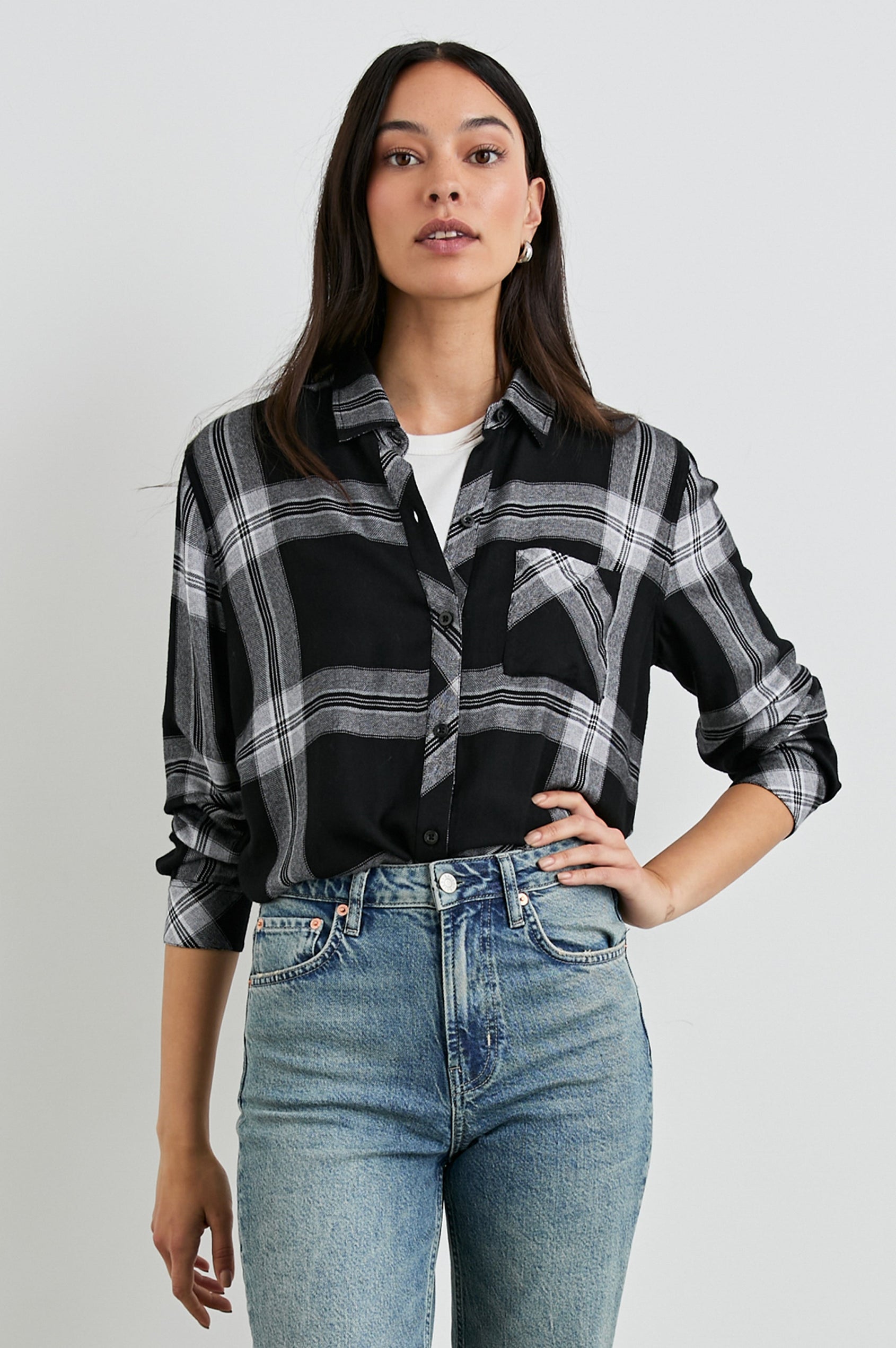 Hunter Long-Sleeve Button Up with a Chest Patch Pocket in Black Cinder Colorway, Black White and Greys Plaid - Front Tucked View Featured on Model