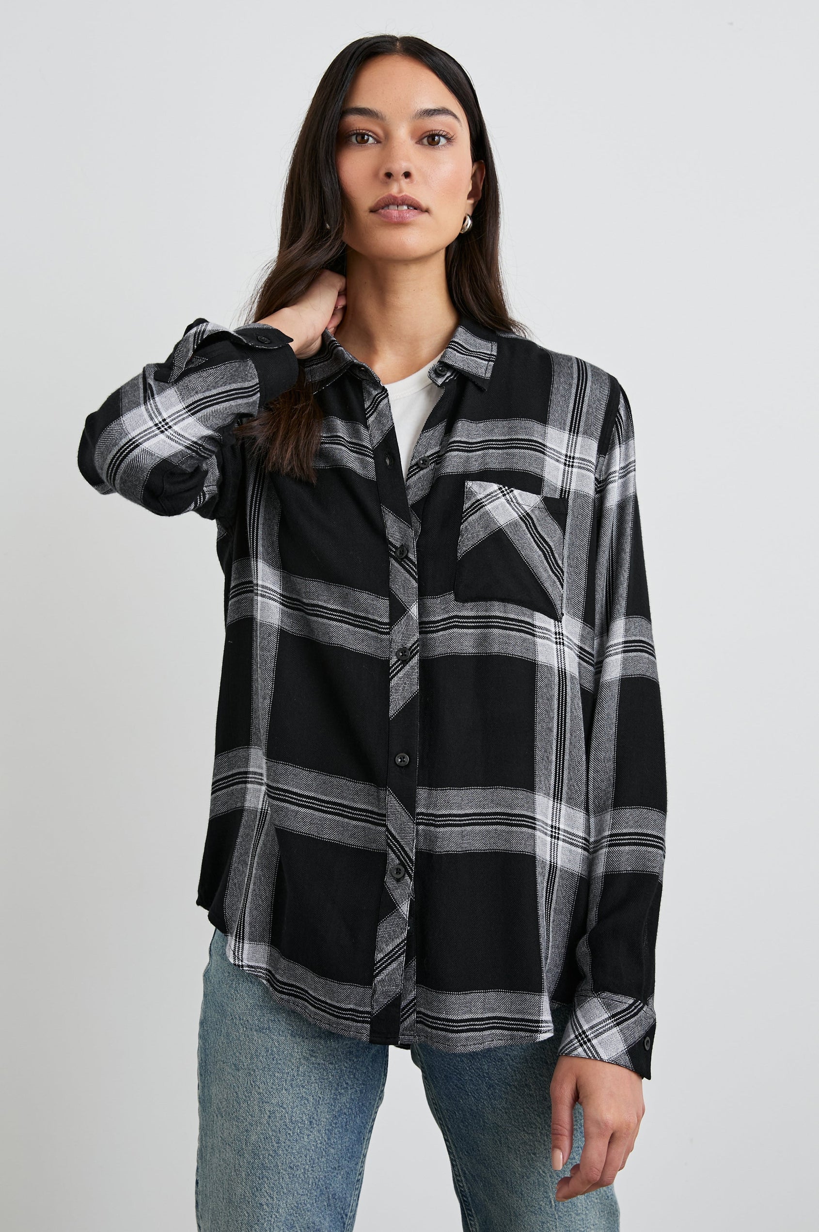 Hunter Long-Sleeve Button Up with a Chest Patch Pocket in Black Cinder Colorway, Black White and Greys Plaid - Front View Featured on Model