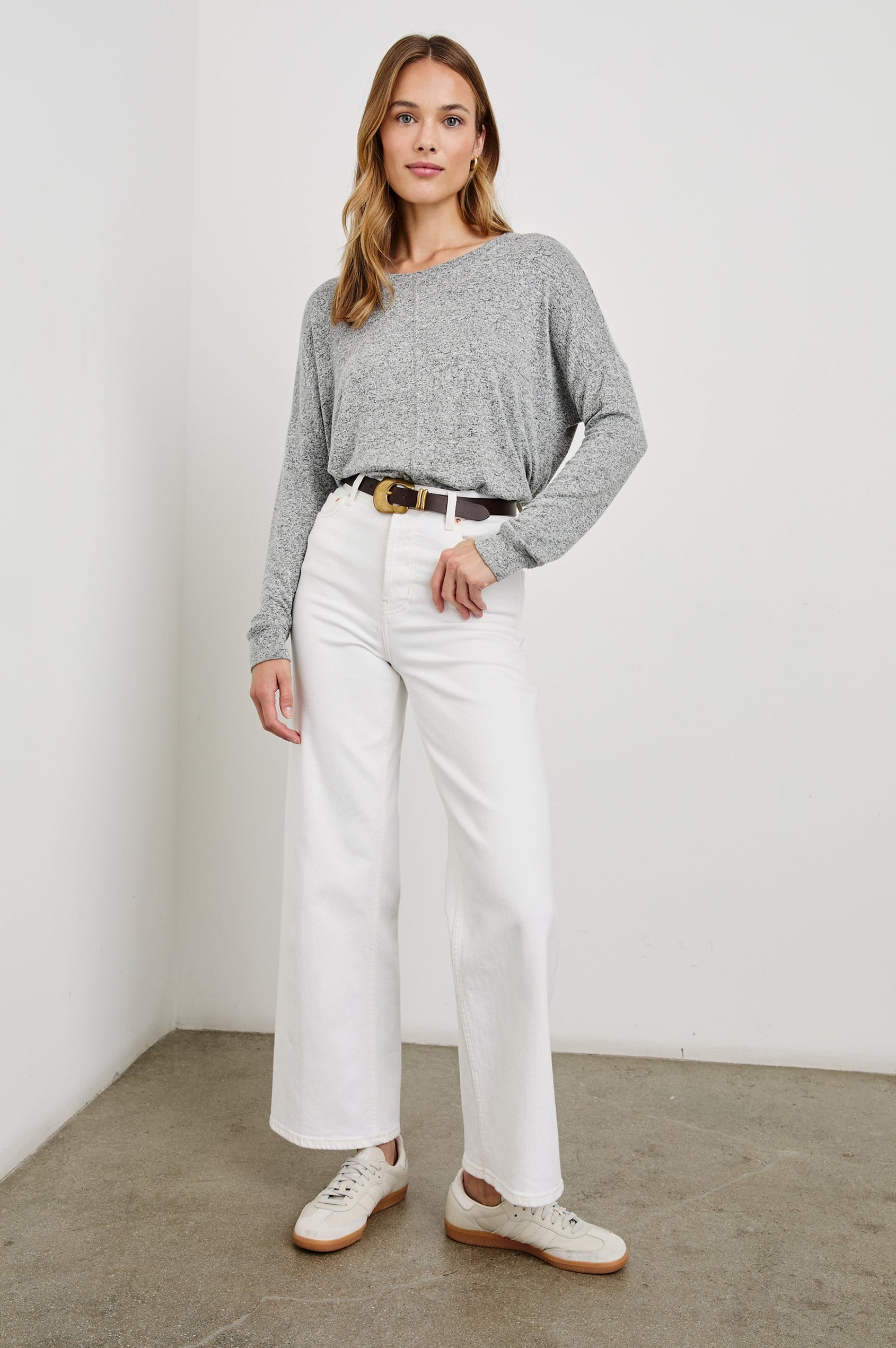 Iggy Long Sleeve Top with a Scoop Neck, Side Slits and a Vertical Seam Down the Front and Back Center in Melange Grey Colorway - Front Tucked Full Body View Featured on Model