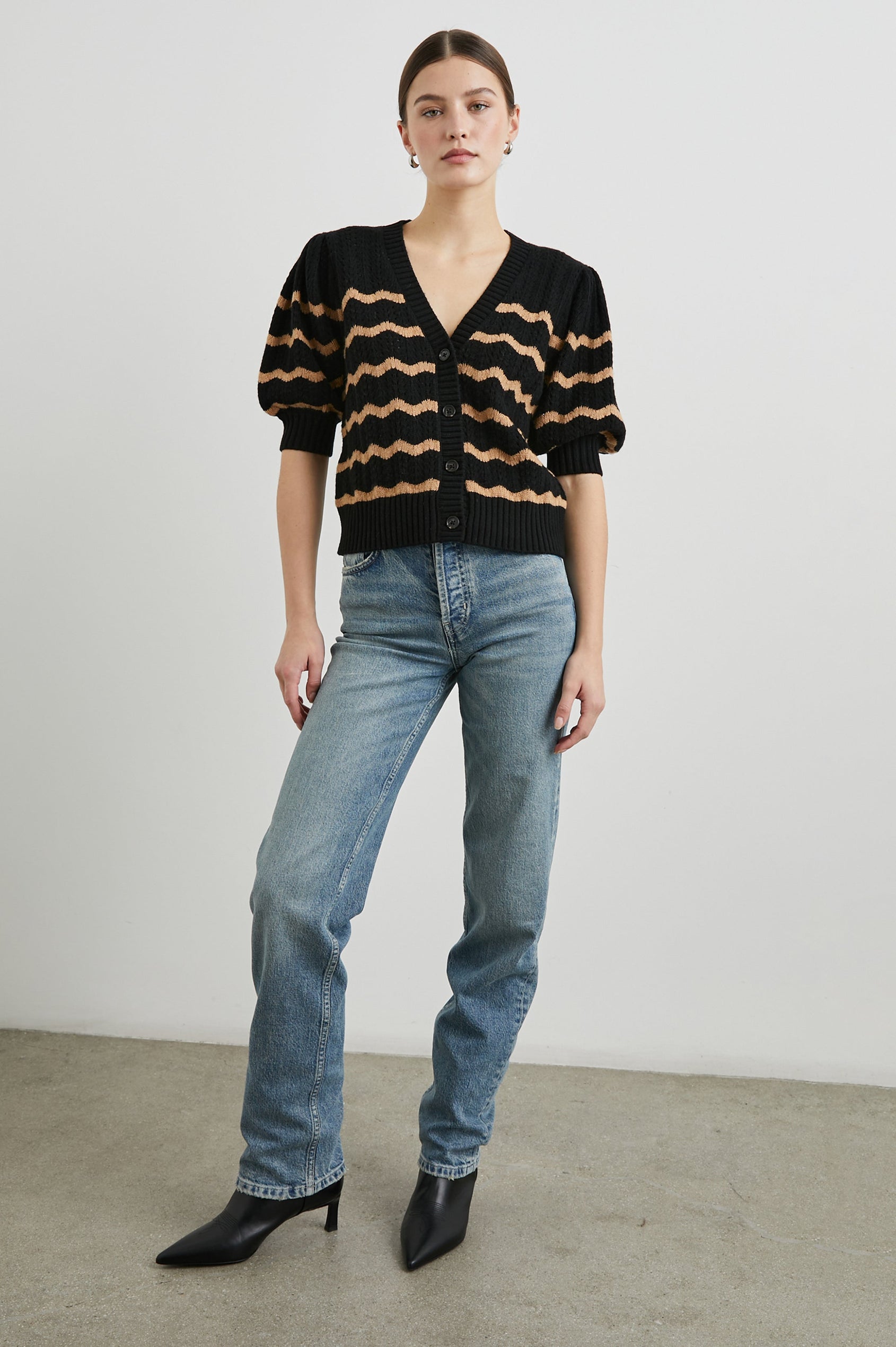 Isla Mid-length-Sleeve Cardigan with Ribbed Hems and Cuffs and Button Closure in Black Camel Stripe Colorway, Horizontal Wavy Stripes - Front Full Body View Featured on Model
