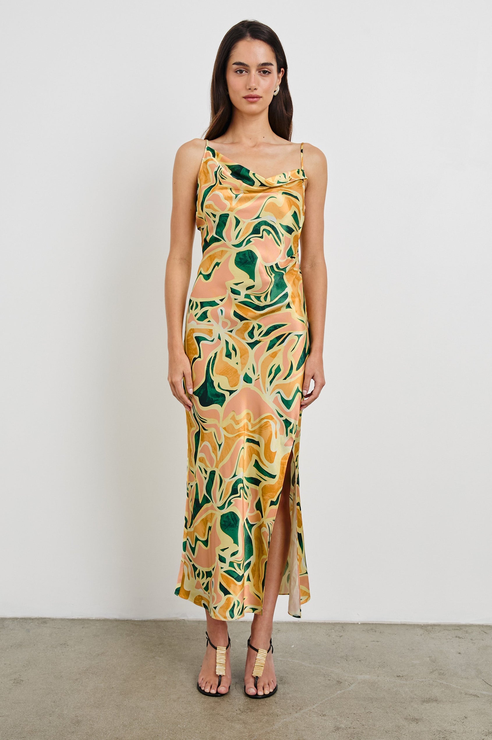 Jackie Midi Cowl Neck Dress with Asymmetrical Spaghetti Straps and a Curved Side Slit in Tulum Colorway. Full Body Front View Shown on Model.