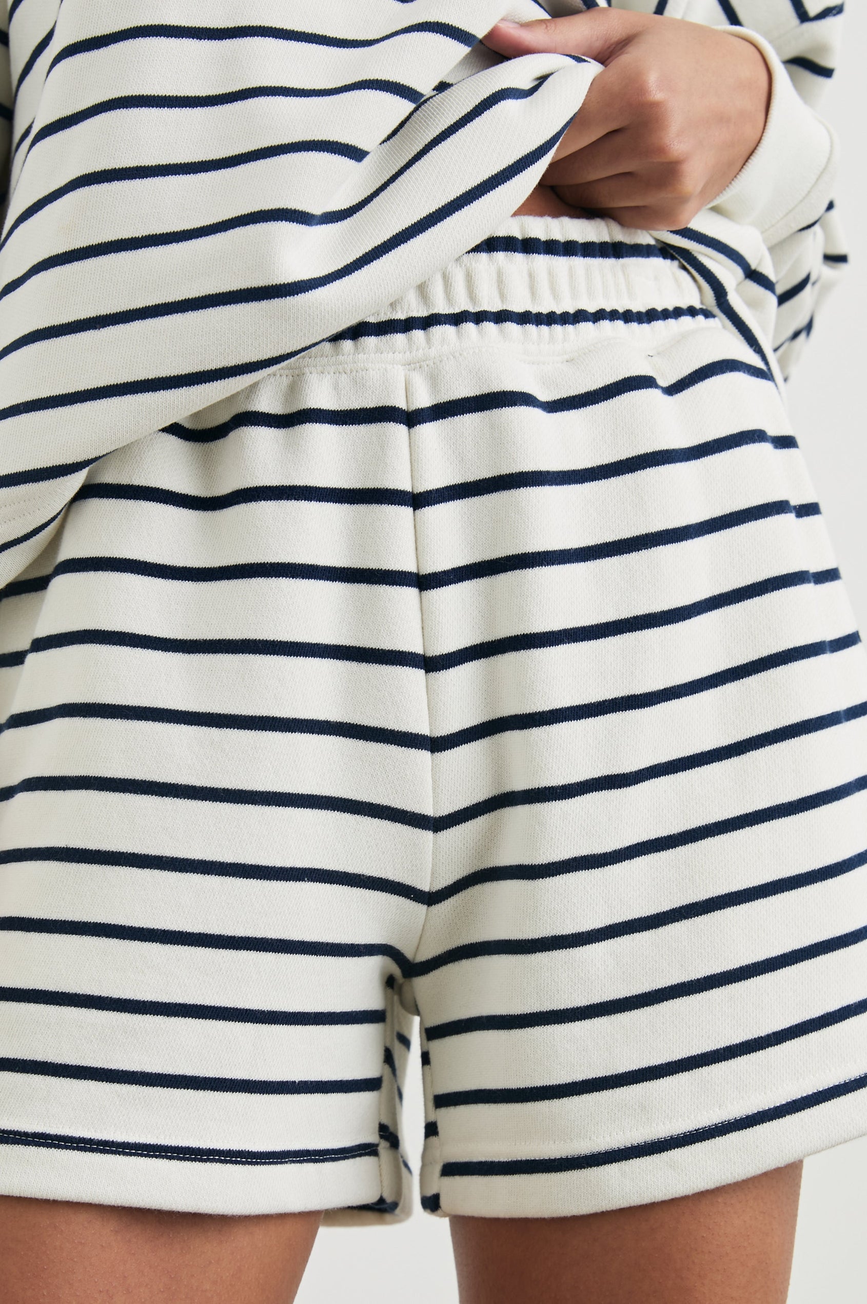 Jane Shorts with a Shirred Waist, Two Front Pockets and a Back Patch Pocket in Sailor Stripe Navy Colorway, Thin Navy Horizontal Stripes on White - Front View Featured on Model