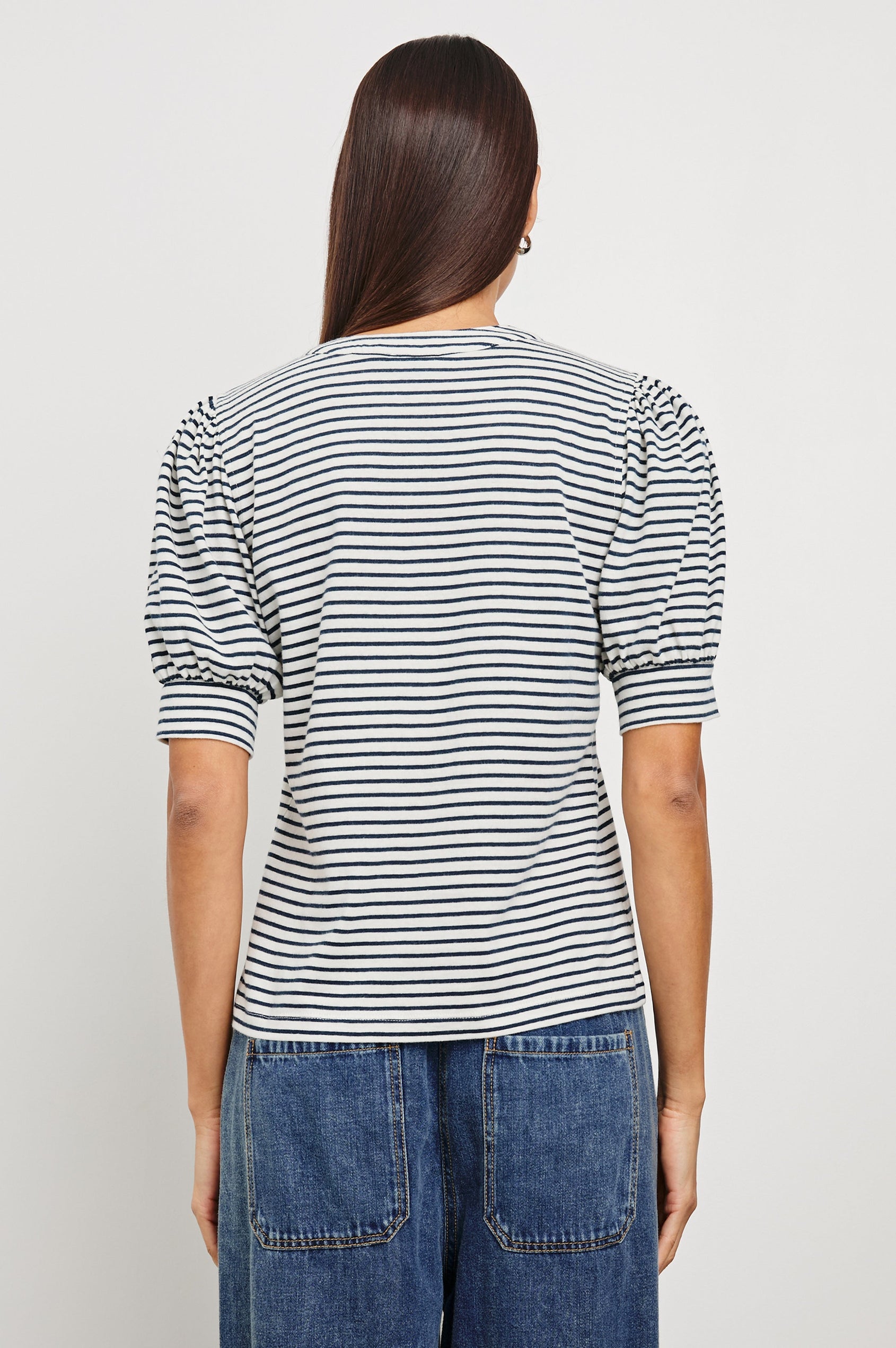 Jewel Puff Short Sleeve With Quarter Down Buttons In Colorway Ivory Navy Micro Stripe - Back View Featured On Model