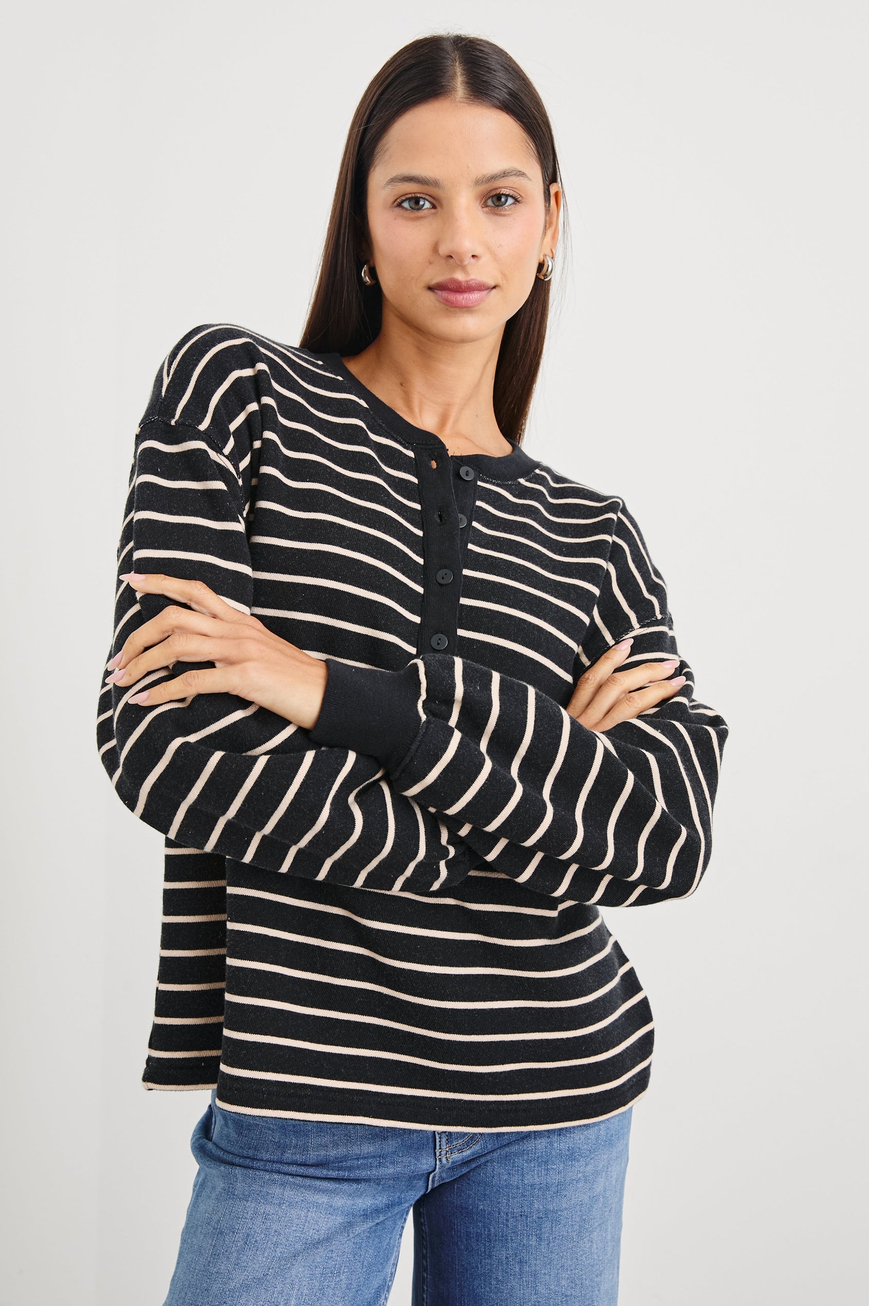 Joan Long-Sleeve Sweatshirt with Buttons to the Mid-Torso and Cuffed sleeves in Black Ivory Stripe Colorway, horizontal stripes - Front View Featured on Model