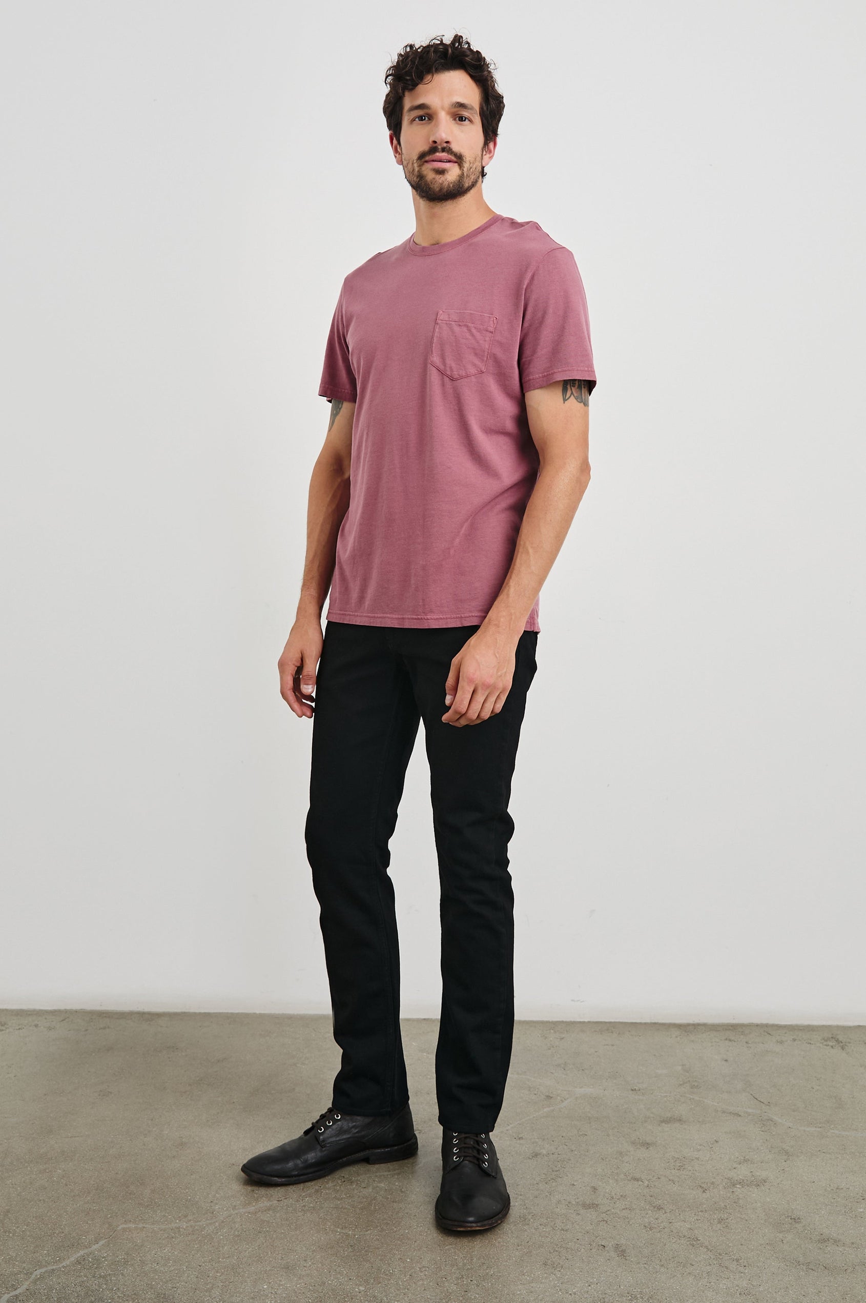Johnny Short Sleeve T-Shirt with a Crew Neck, Chest Patch Pocket and Small Slits at the Side Hems in Cranberry Colorway - Front Full Body View Featured on Model