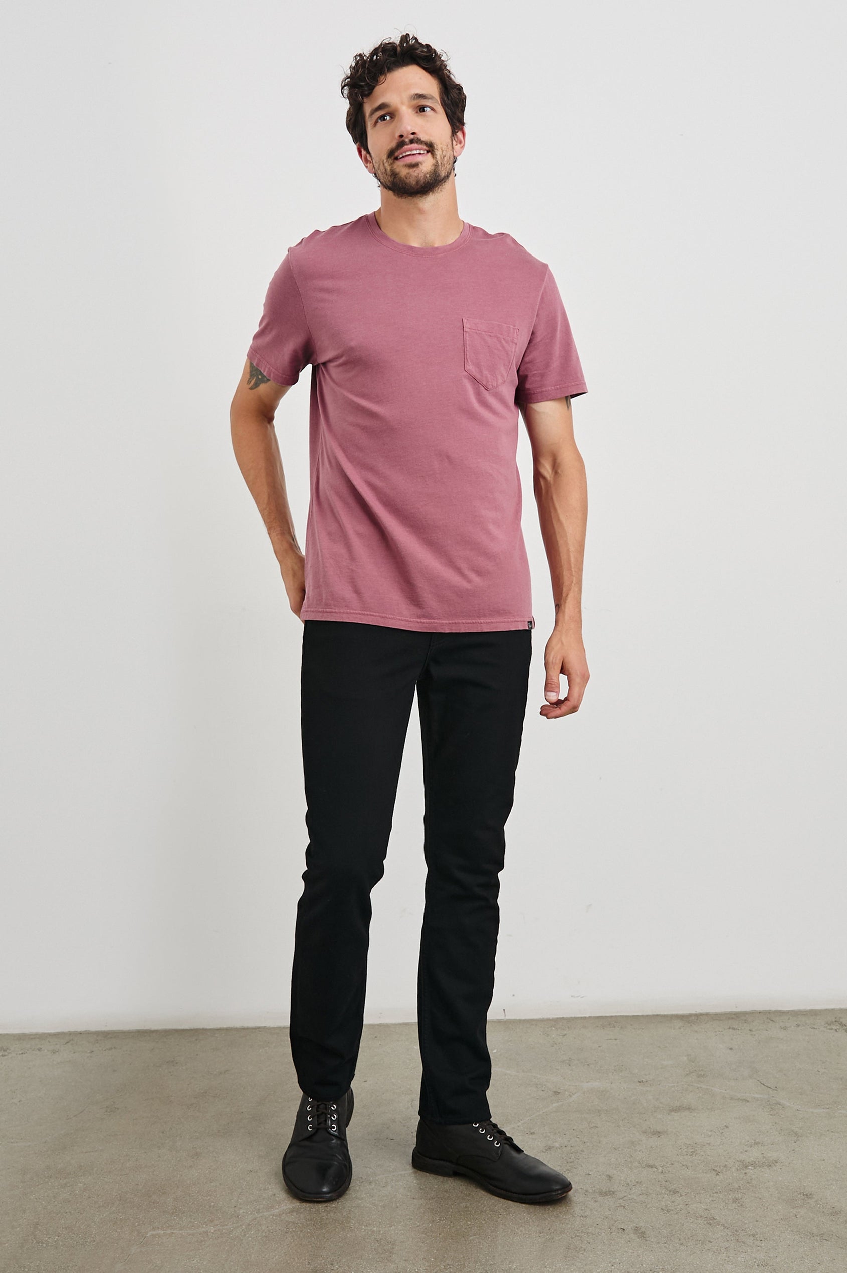 Johnny Short Sleeve T-Shirt with a Crew Neck, Chest Patch Pocket and Small Slits at the Side Hems in Cranberry Colorway - Front Full Body View Featured on Model