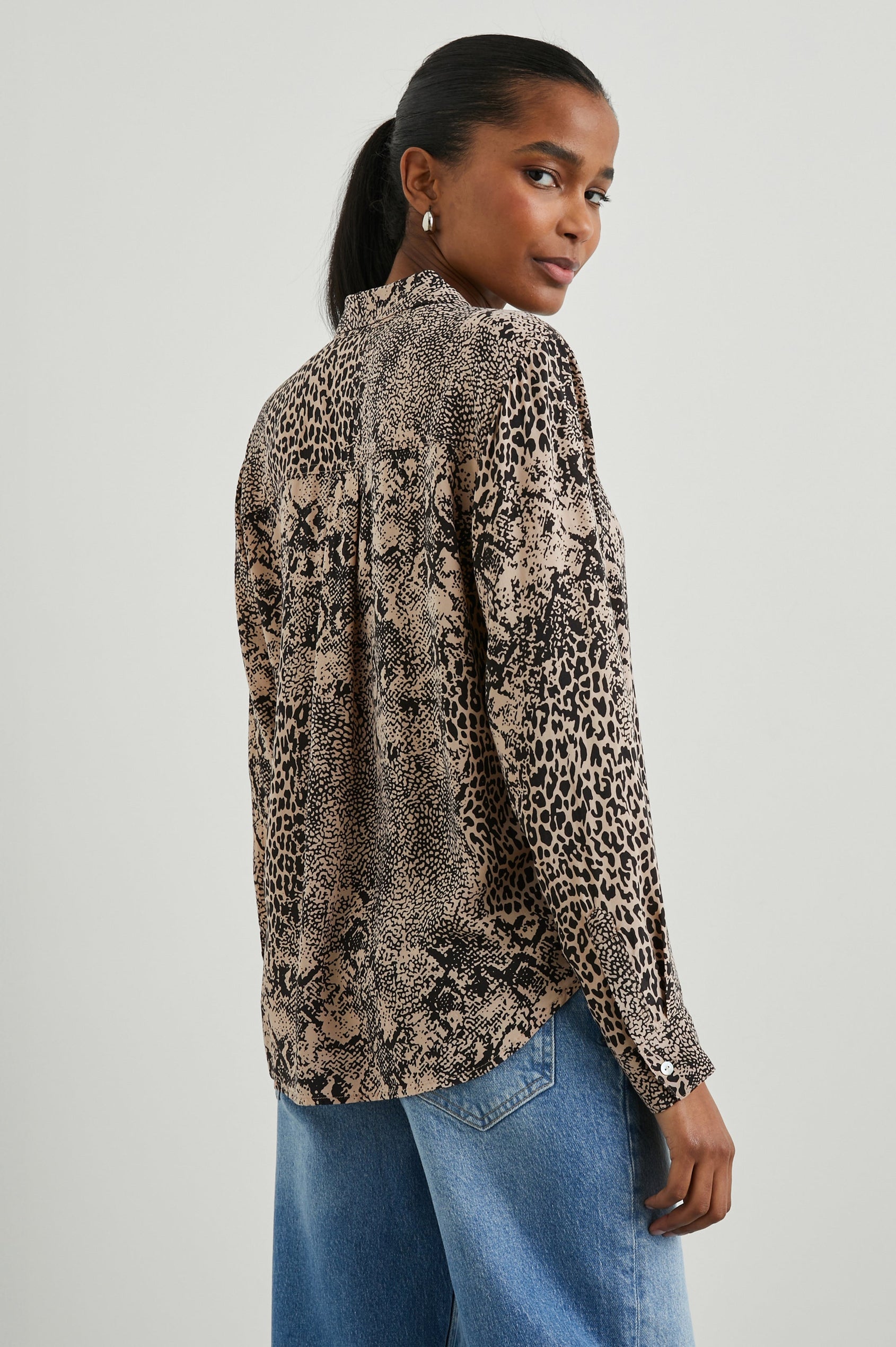Josephine Long-Sleeve Button Down with a Chest Patch Pocket in Taupe Mixed Animal Colorway, black animal patterns on taupe - Back View Featured on Model