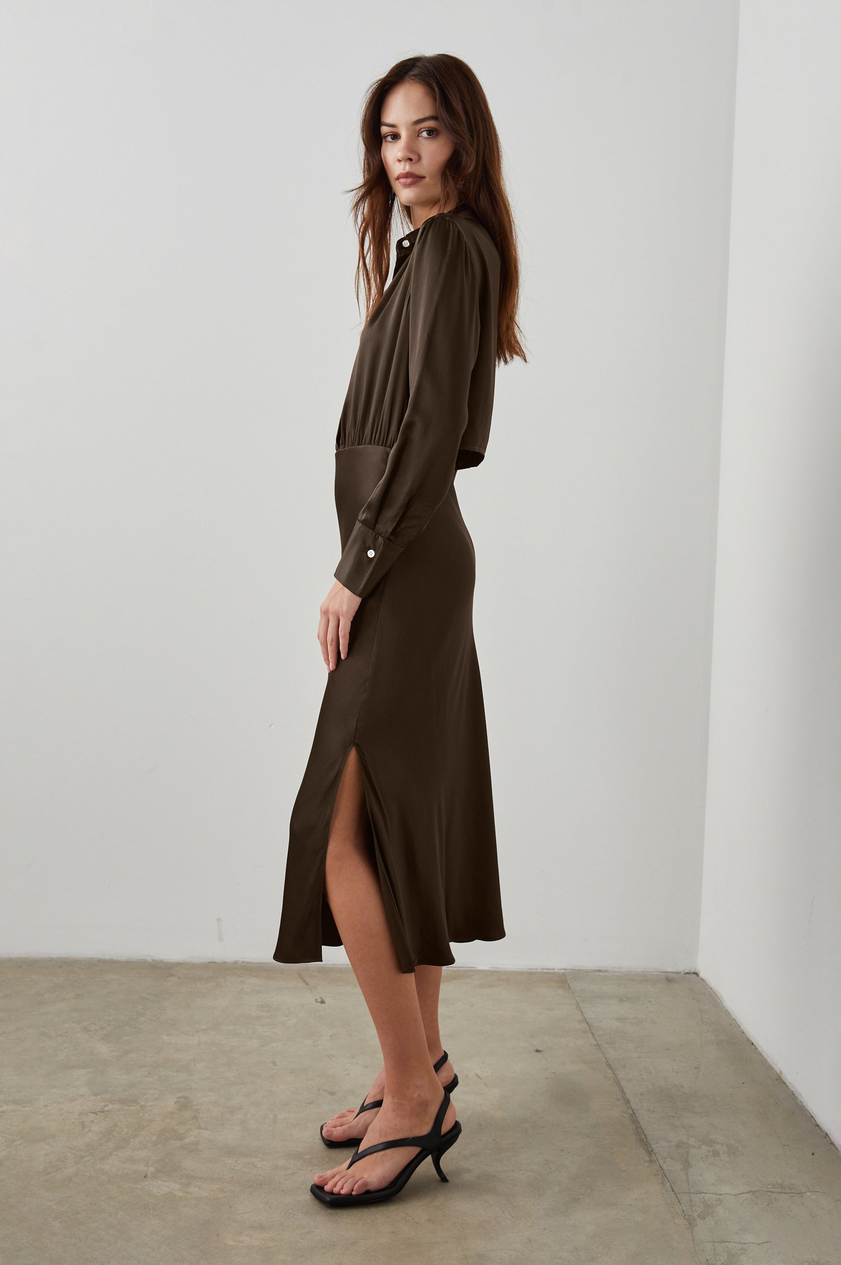 Kathleen Long-Sleeve Midi Dress with Buttons Down the Bodice, a Collar, Buttoned Cuffs, and a Side Thigh Slit in Dark Moss Colorway - Side Full Body View Featured on Model