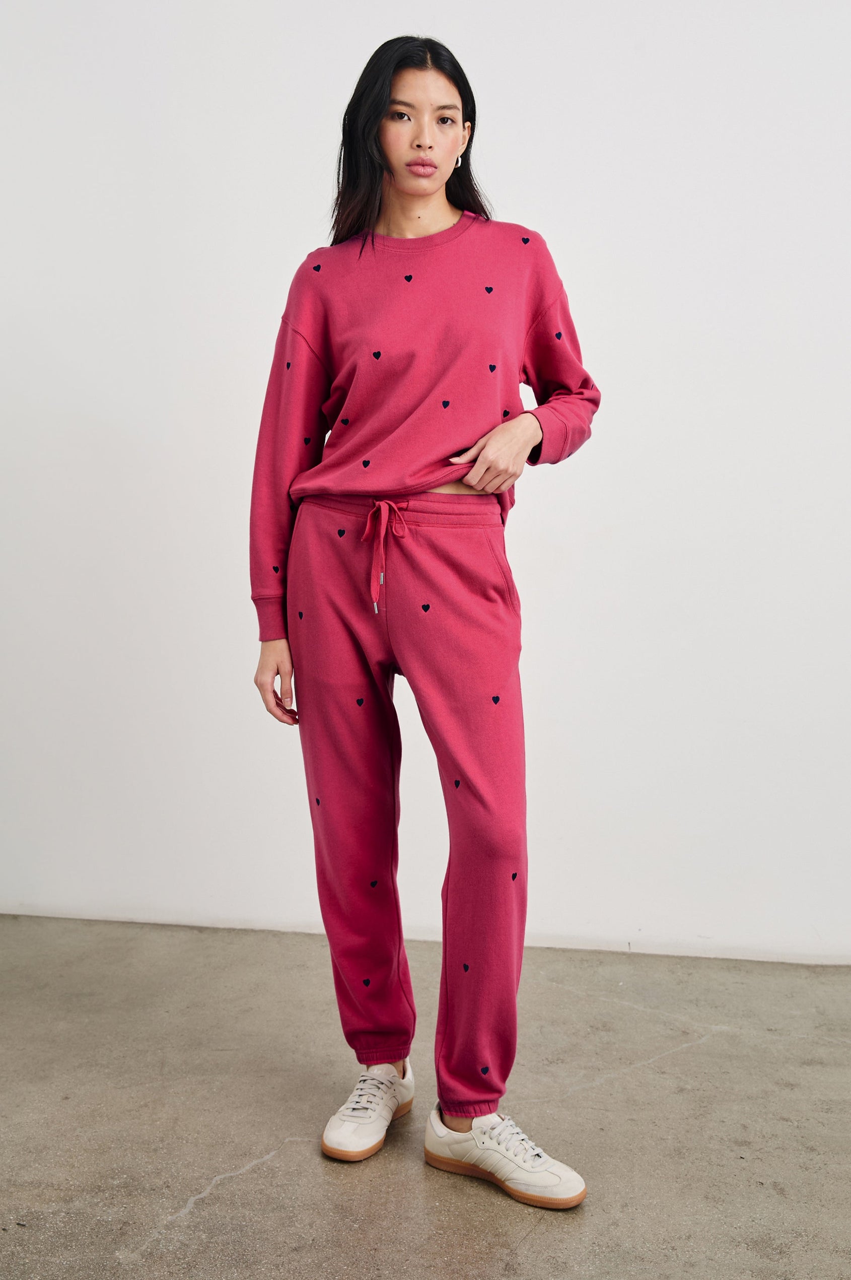 Kingston Pants with Elastic Cuffs and Waist with Drawcord in Pink Midnight Hearts Colorway, Midnight Hearts on Pink - Front Full Body View Featured on Model