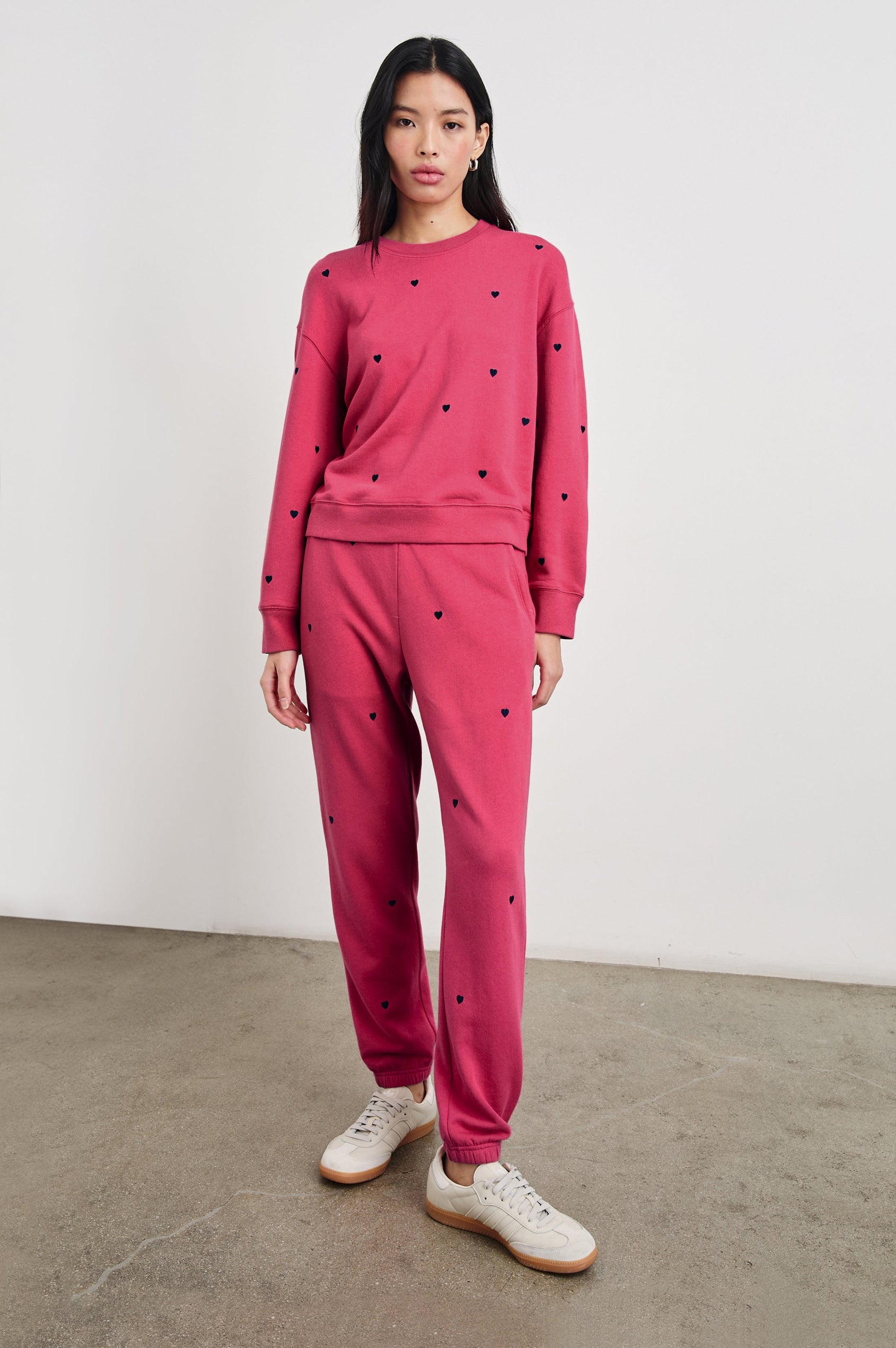 Kingston Pants with Elastic Cuffs and Waist with Drawcord in Pink Midnight Hearts Colorway, Midnight Hearts on Pink - Front Full Body View Featured on Model