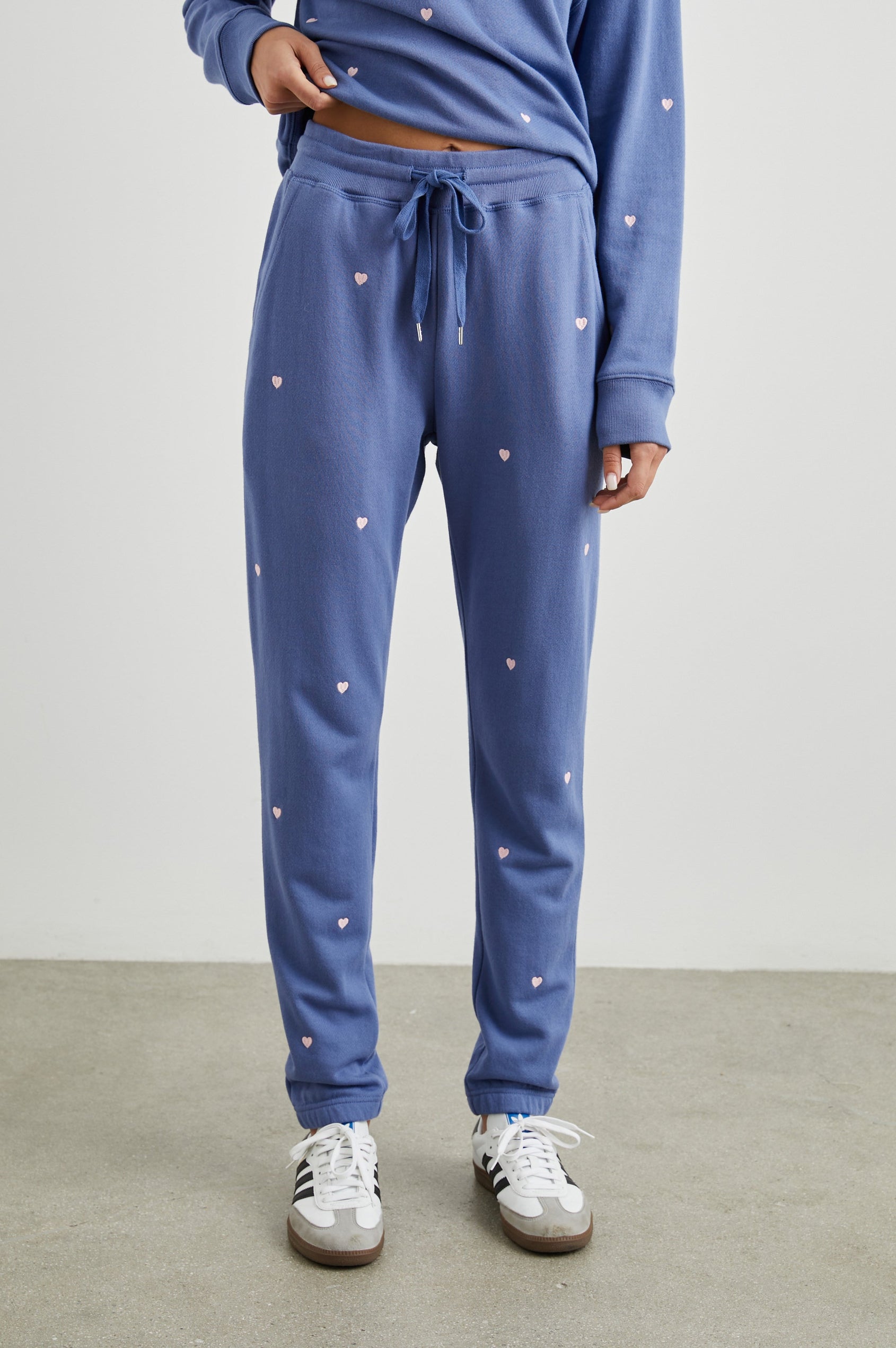 Kingston Sweatpants with Elastic Cuffs and Waist with Drawcord in Pink Periwinkle Hearts Embroidery Colorway, Pink Hearts on Periwinkle - Front View Featured on Model