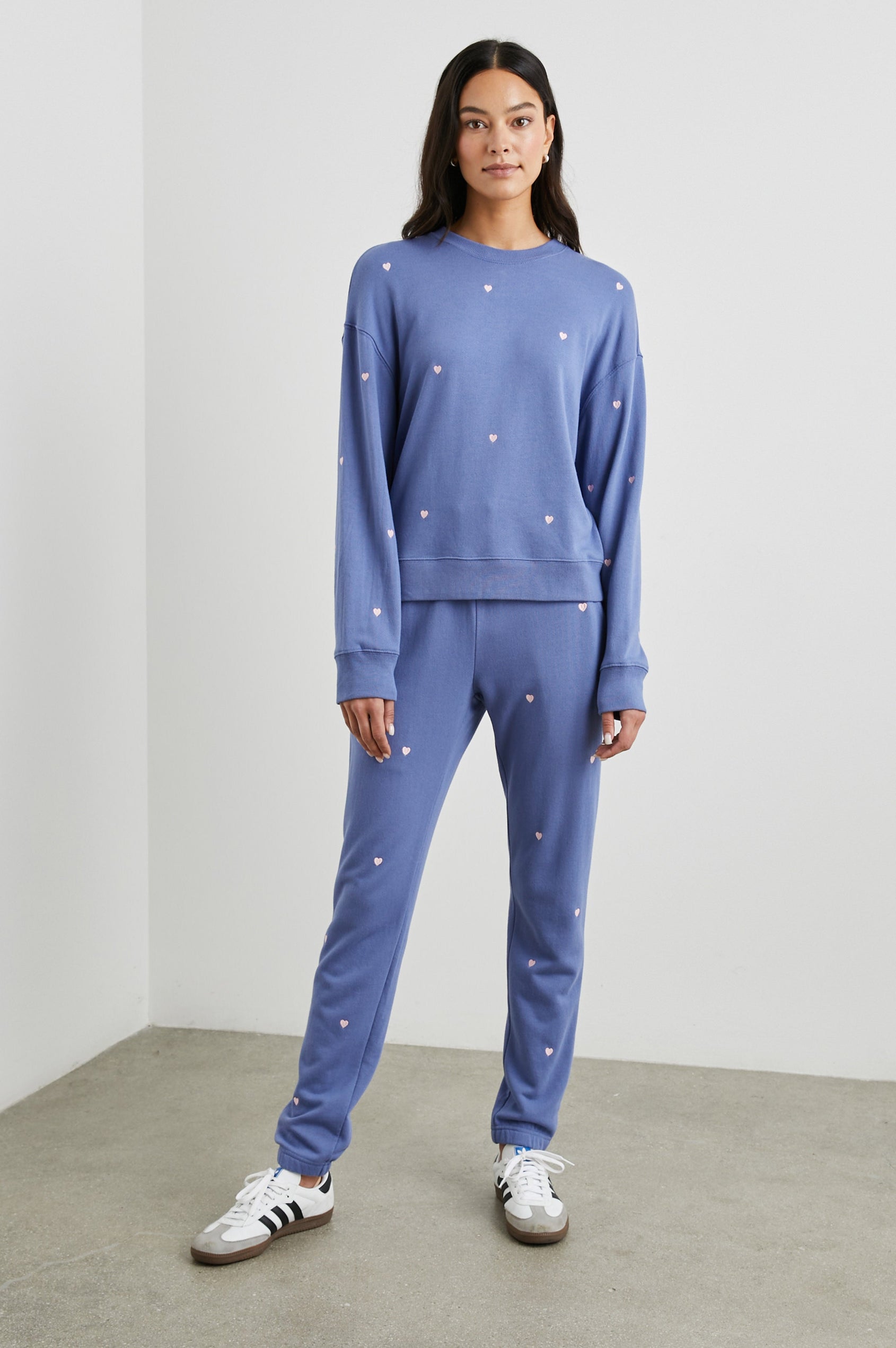 Kingston Sweatpants with Elastic Cuffs and Waist with Drawcord in Pink Periwinkle Hearts Embroidery Colorway, Pink Hearts on Periwinkle - Front Full Body View Sweatpants on Model