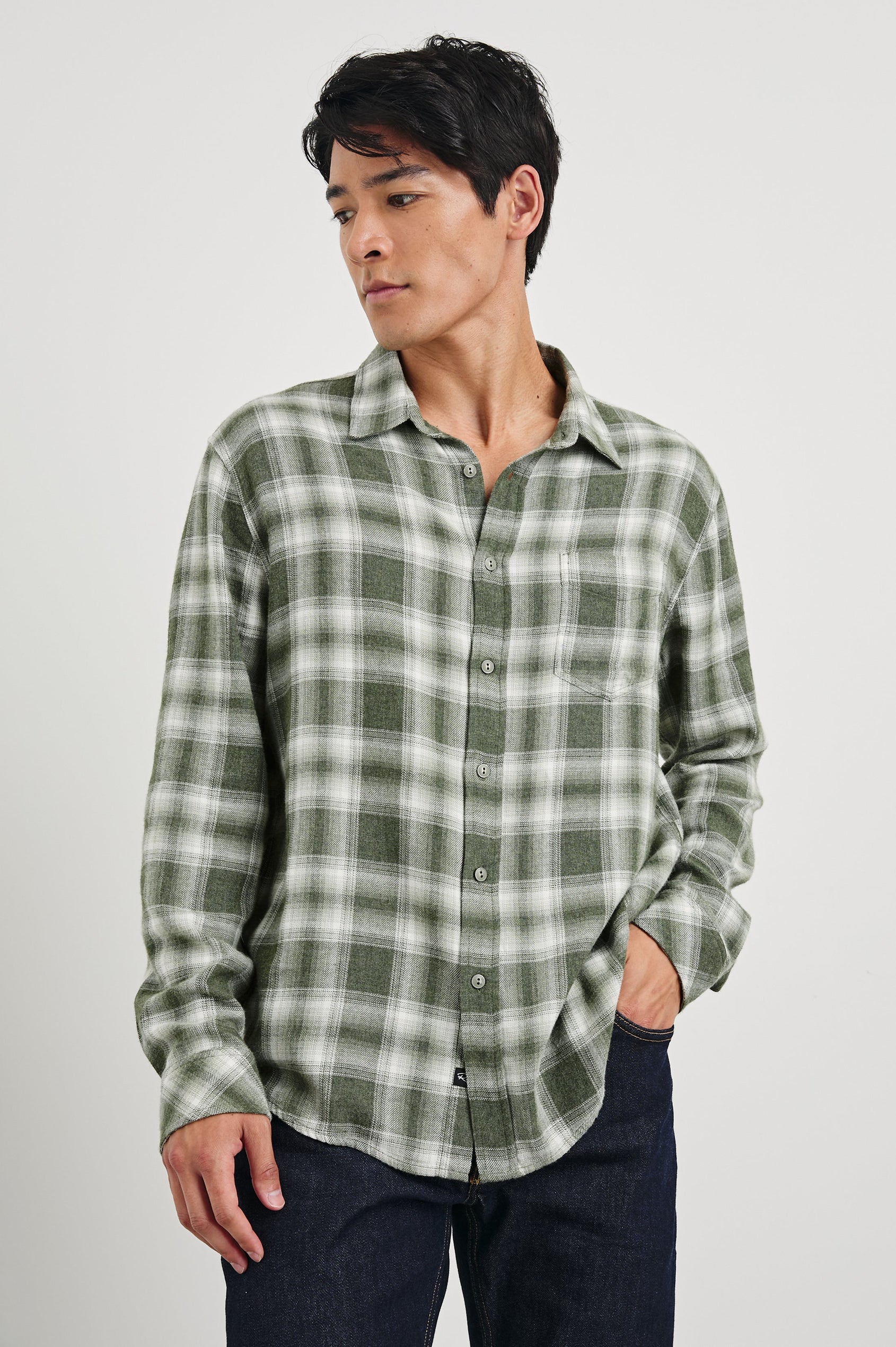 Lennox Long-Sleeve Button Up with a Chest Patch Pocket in Deep Meadow White Colorway, a plaid in Green and White - Front View Featured on Model