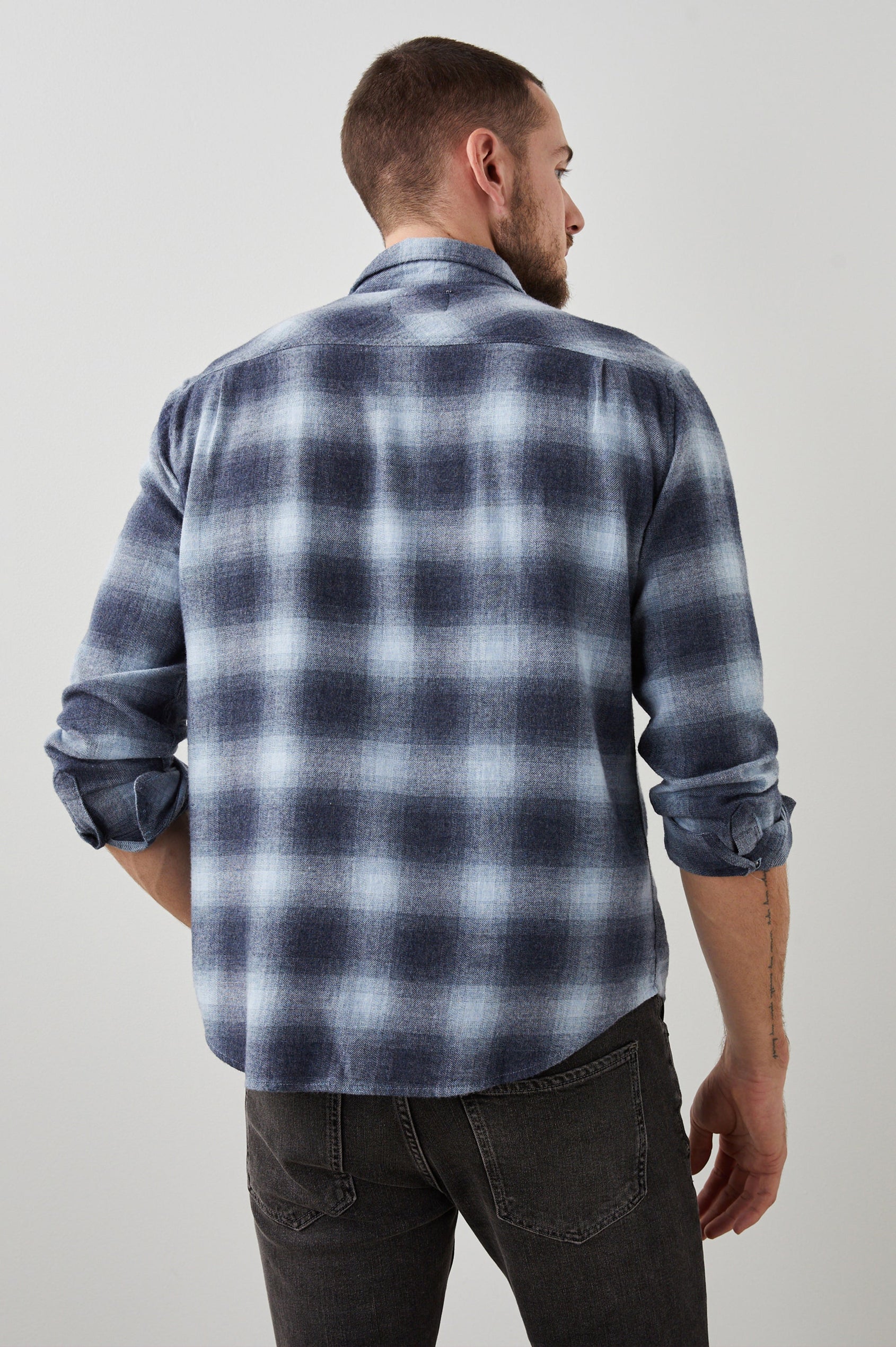 Lennox Long-Sleeve Button Up with a Chest Patch Pocket in Denim Shadow Colorway, a plaid in Denim, Grey and White- Back View Featured on Model