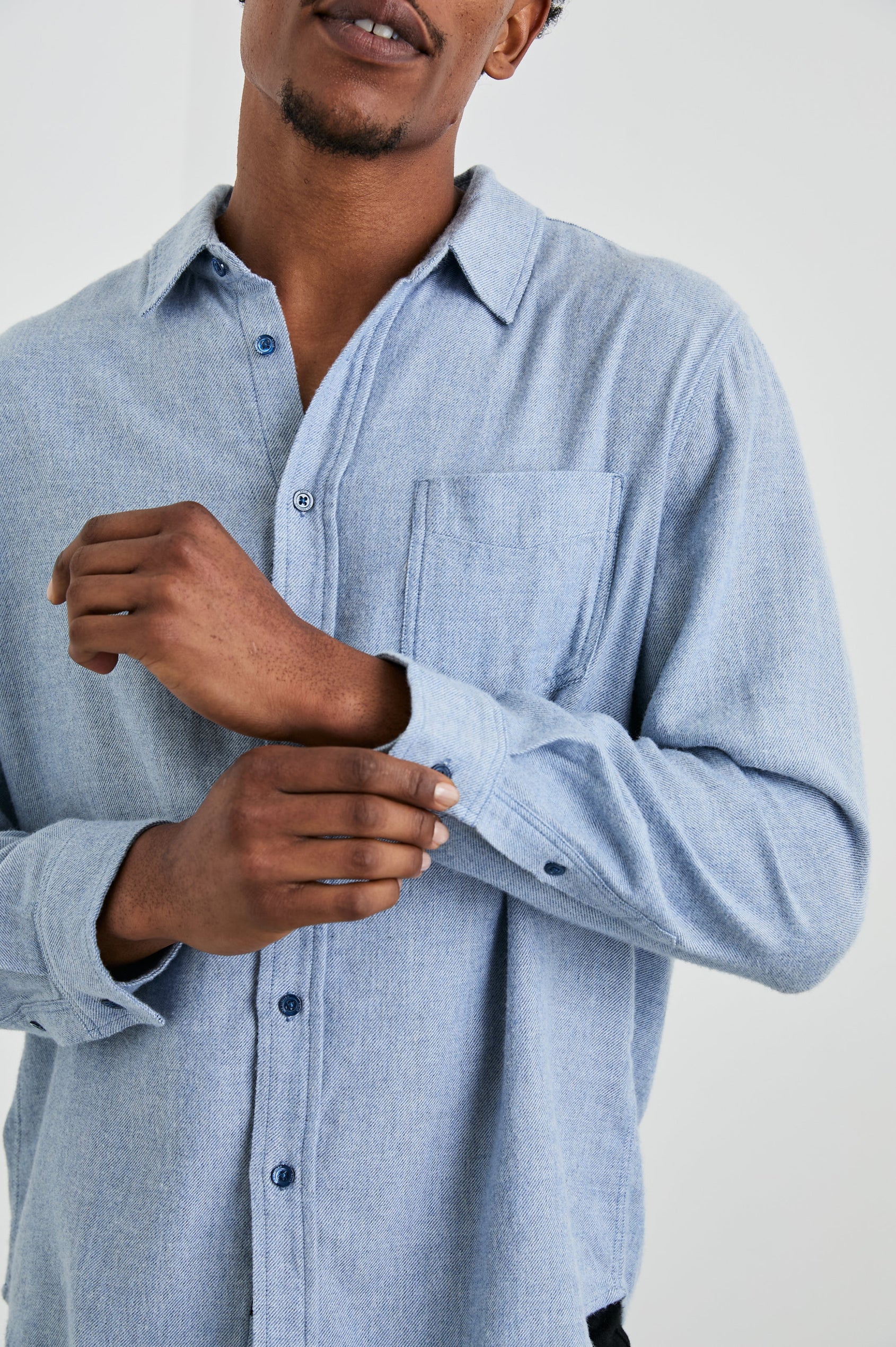Lennox Long-Sleeve Button Up with a Chest Patch Pocket in Kodiak Blue Melange Colorway - Front View Featured on Model