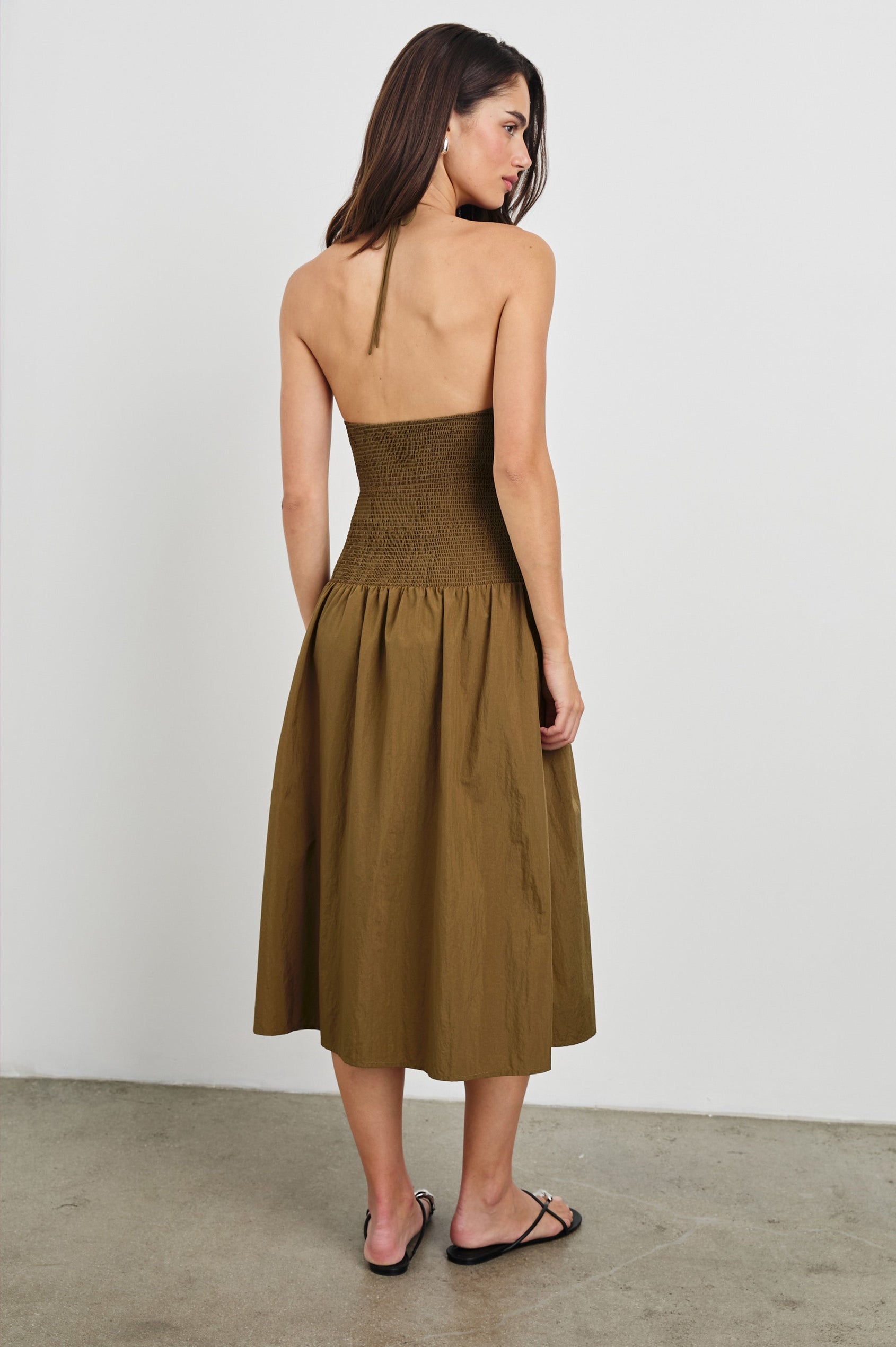 Leslie Midi Halter Dress with a Drop Waist, Contrast Skirt and a Square Neckline in Sepia Colorway. Full Body Back View Shown on Model.
